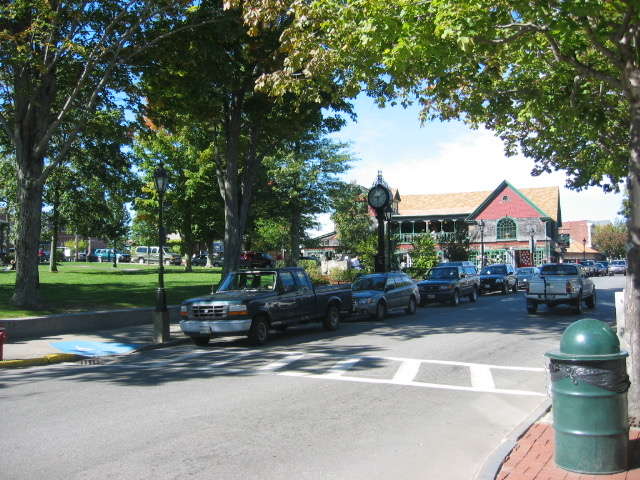 The Village Green park in downtown Bar Harbor, Maine, with trees and a gazebo