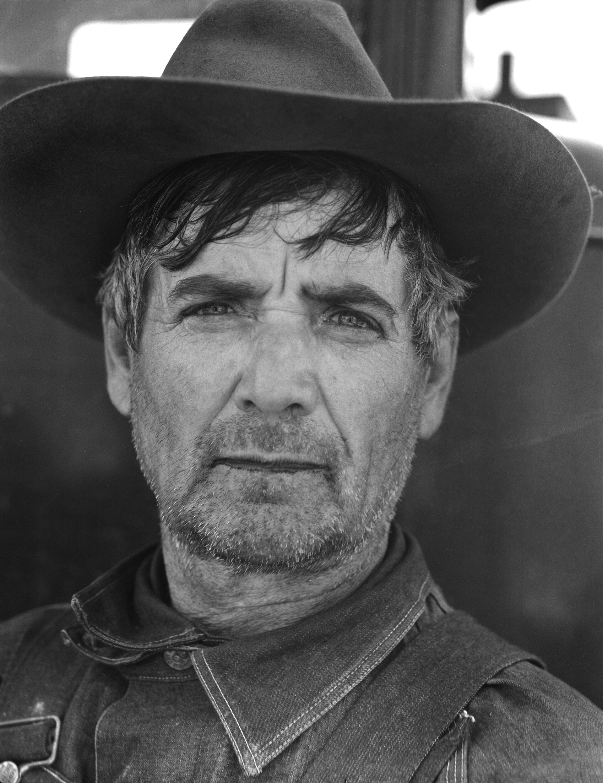 Dorothea Lange's black-and-white 1936 photograph of a migrant pea picker in Nipomo, California.