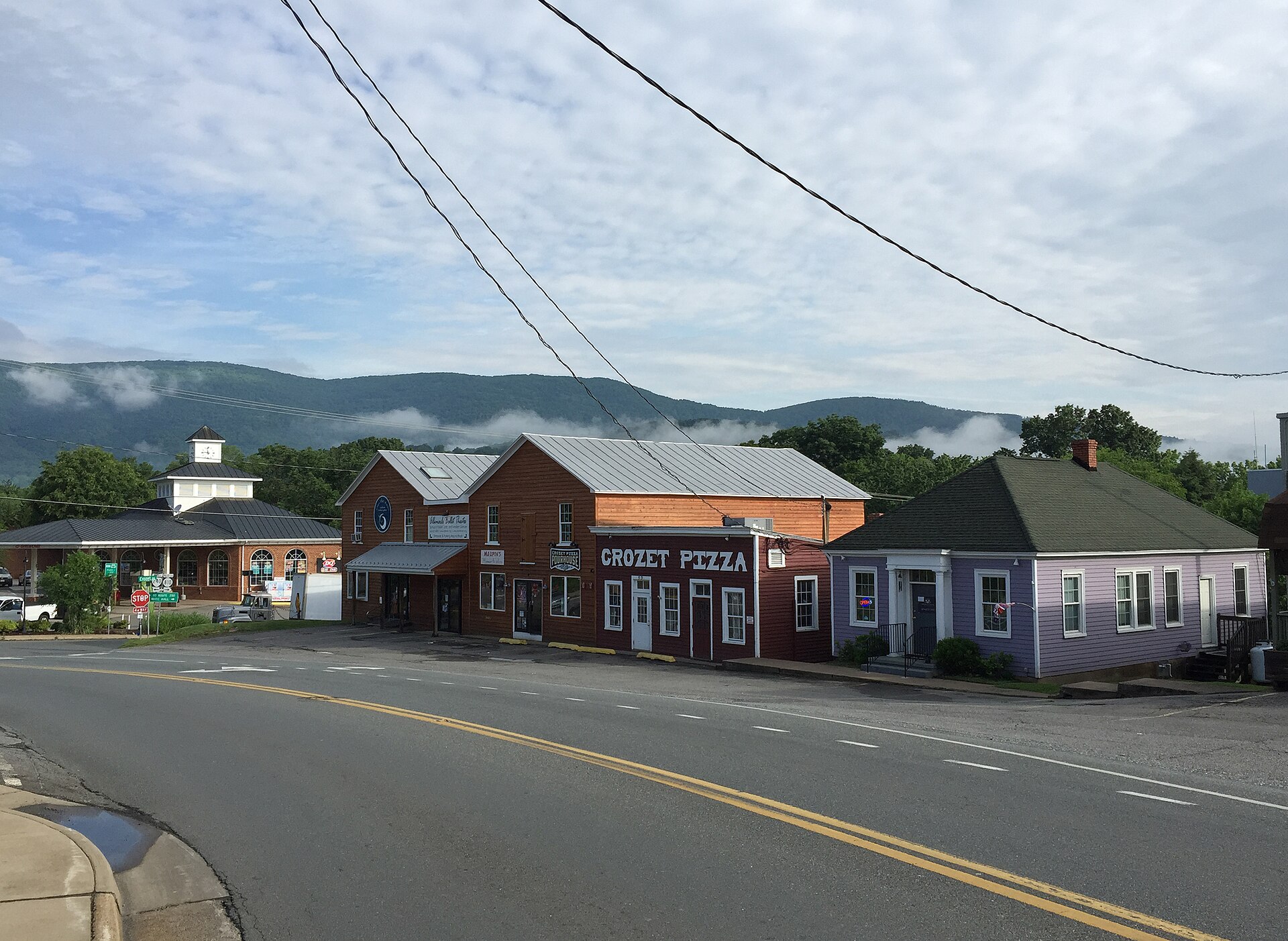 Shops along Three Notch'd Road in downtown Crozet, Virginia, with the Blue Ridge in the distance