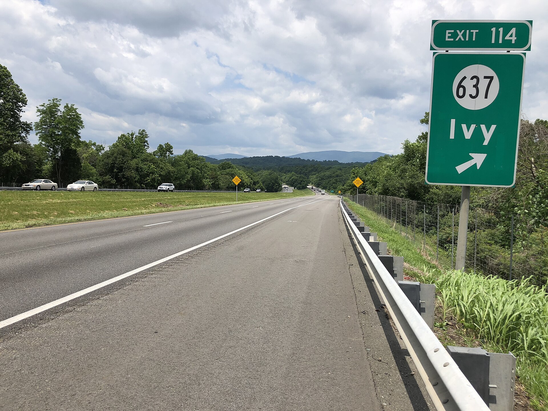 View west along Interstate 64 at Exit 114 for Ivy Virginia.