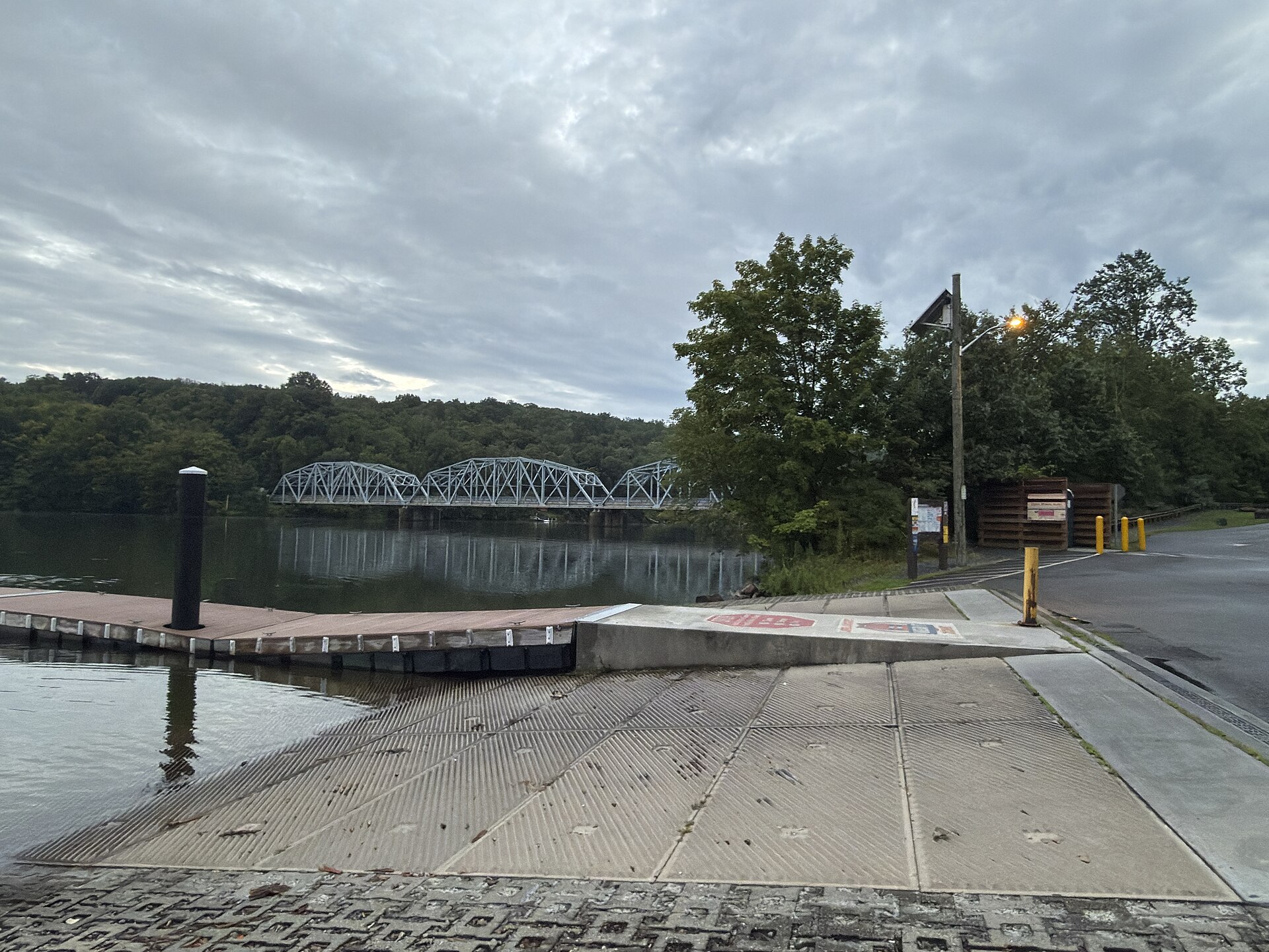 Boat launch ramp on Lake Lillinonah in Bridgewater, Connecticut, with the Southville Bridge in the distance