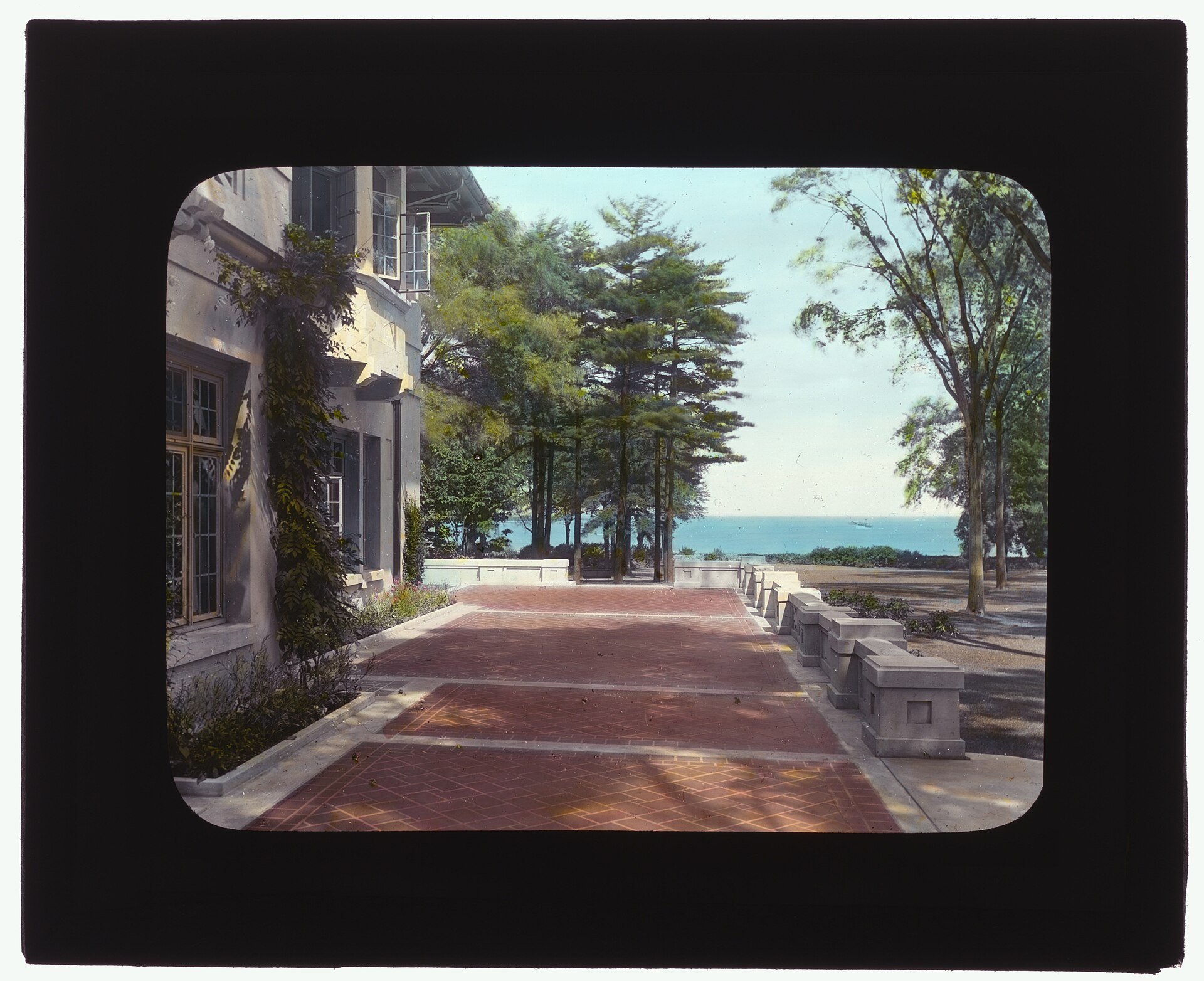 Title: Arnold Schlaet house, Campo Point, Saugatuck, Connecticut. Terrace Abstract/medium: 1 photograph : glass lantern slide, hand-colored ; 3.25 x 4 in.