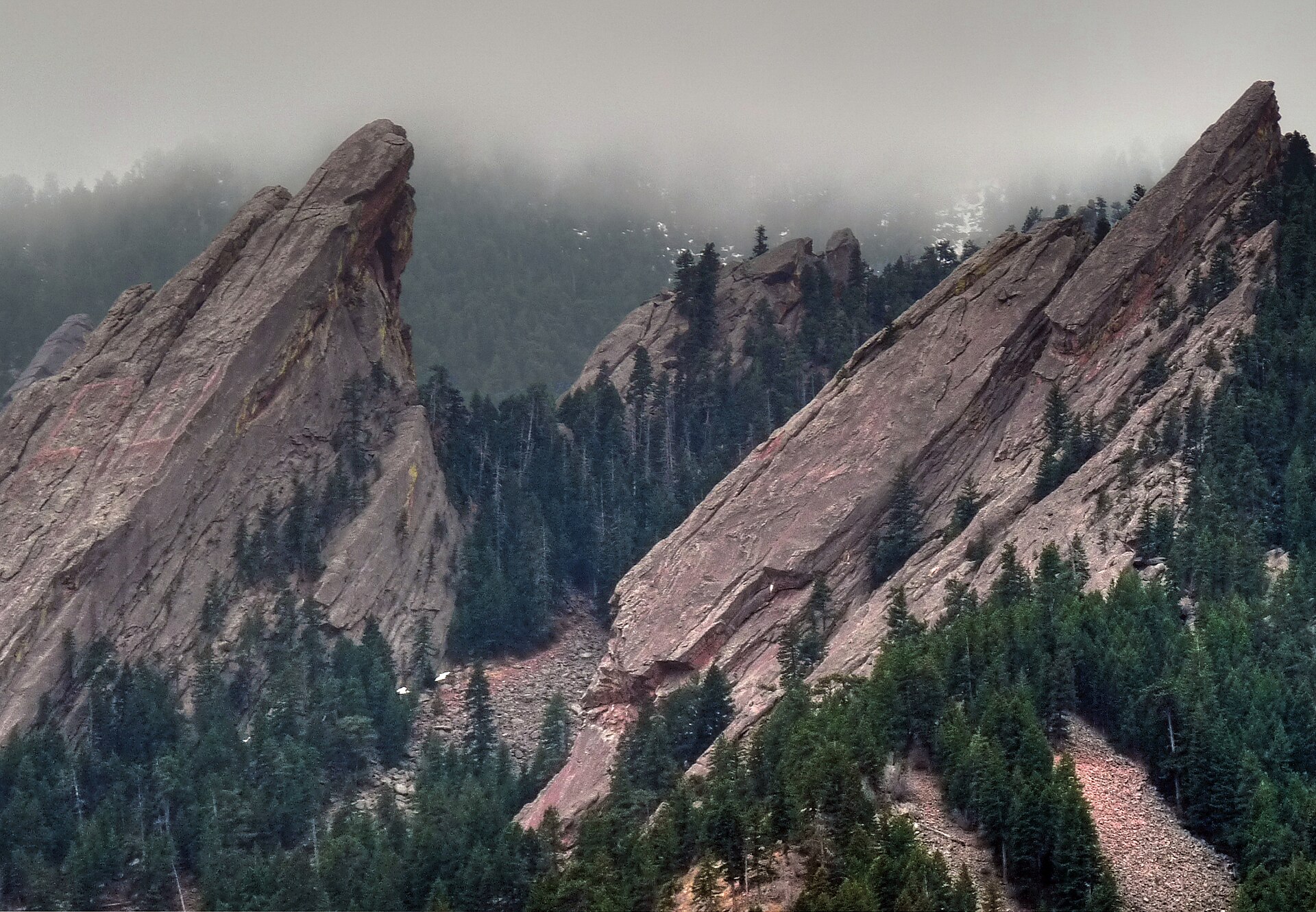 The title is odd unless you know a bit about Boulder, Colorado. The Flatirons frame the skyline of Boulder. They're the vanguard of the Front Range - the beginning of the Rocky Mountains. These...