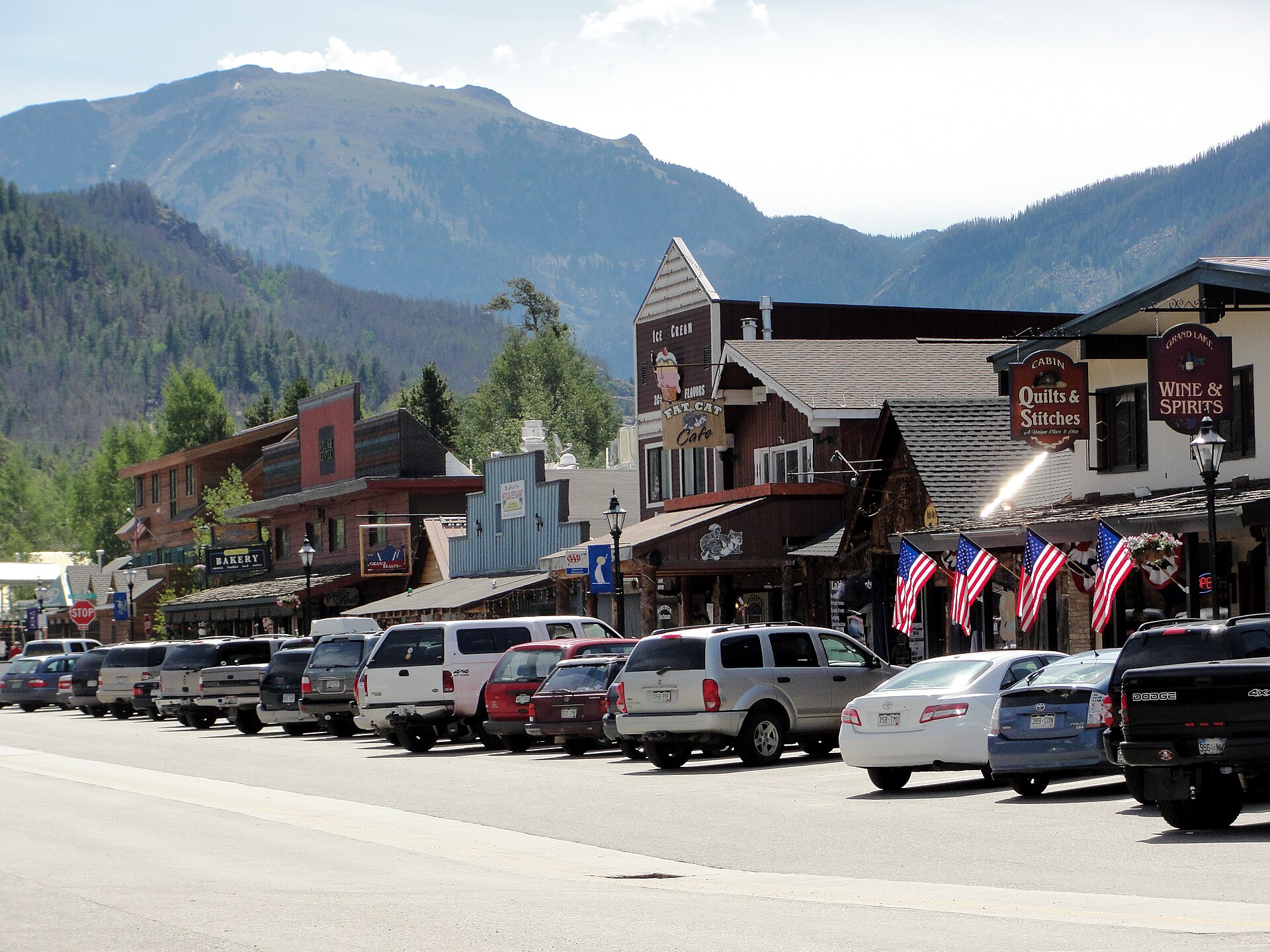 Main street in downtown Grand Lake, Colorado, with shops and mountain views