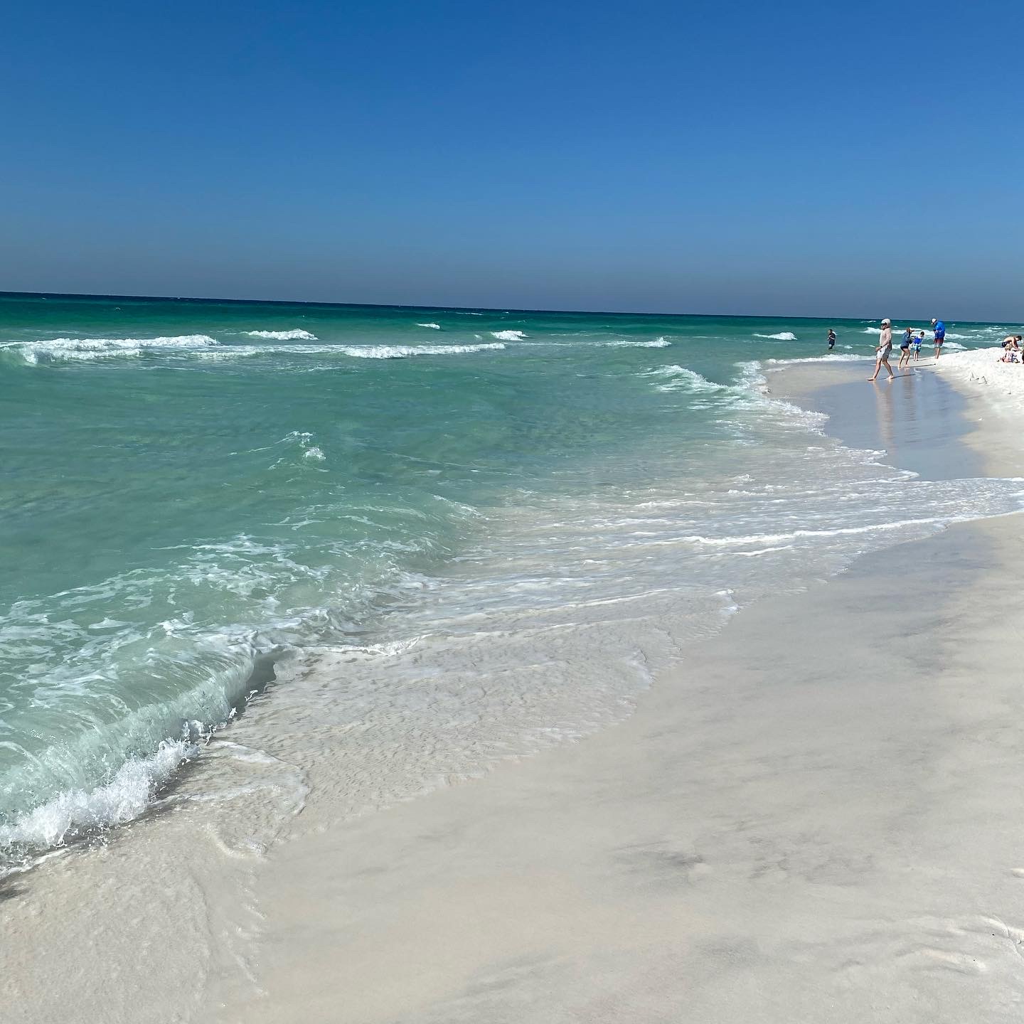White sand and turquoise surf at Miramar Beach