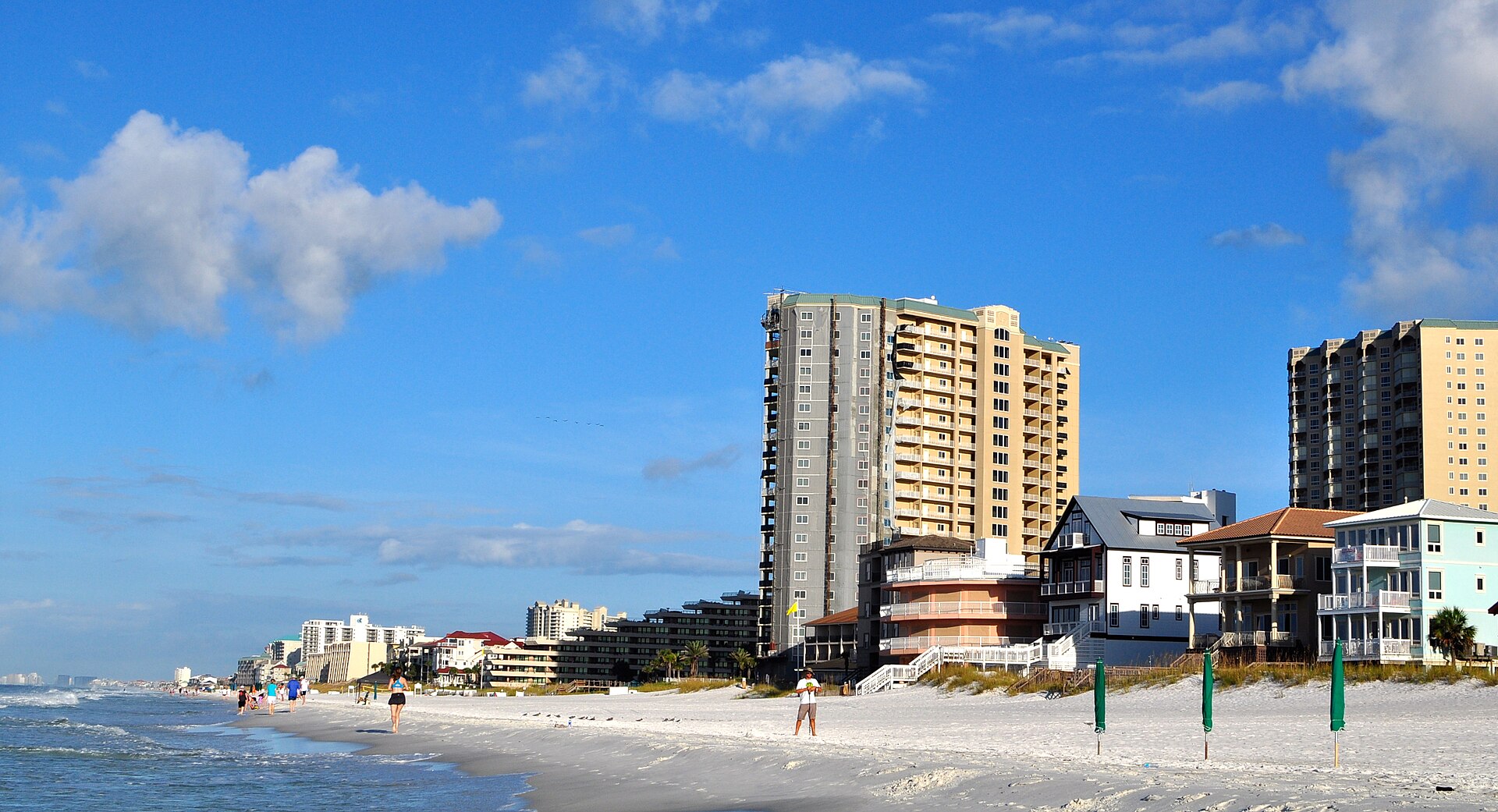 Beachfront condominiums and houses along the sand at Miramar Beach