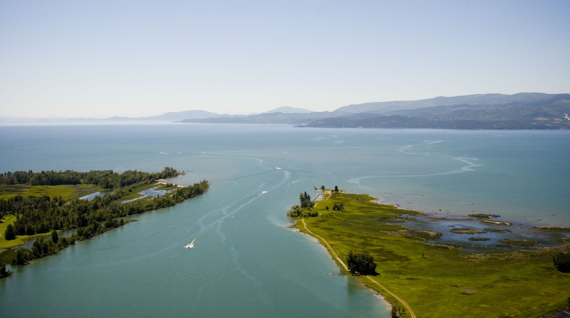 An aerial view where the Flathead River empties into the north end of Flathead Lake Montana.