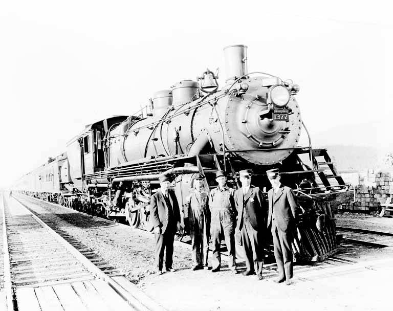Great Northern steam locomotive and crew near Whitefish, circa 1930