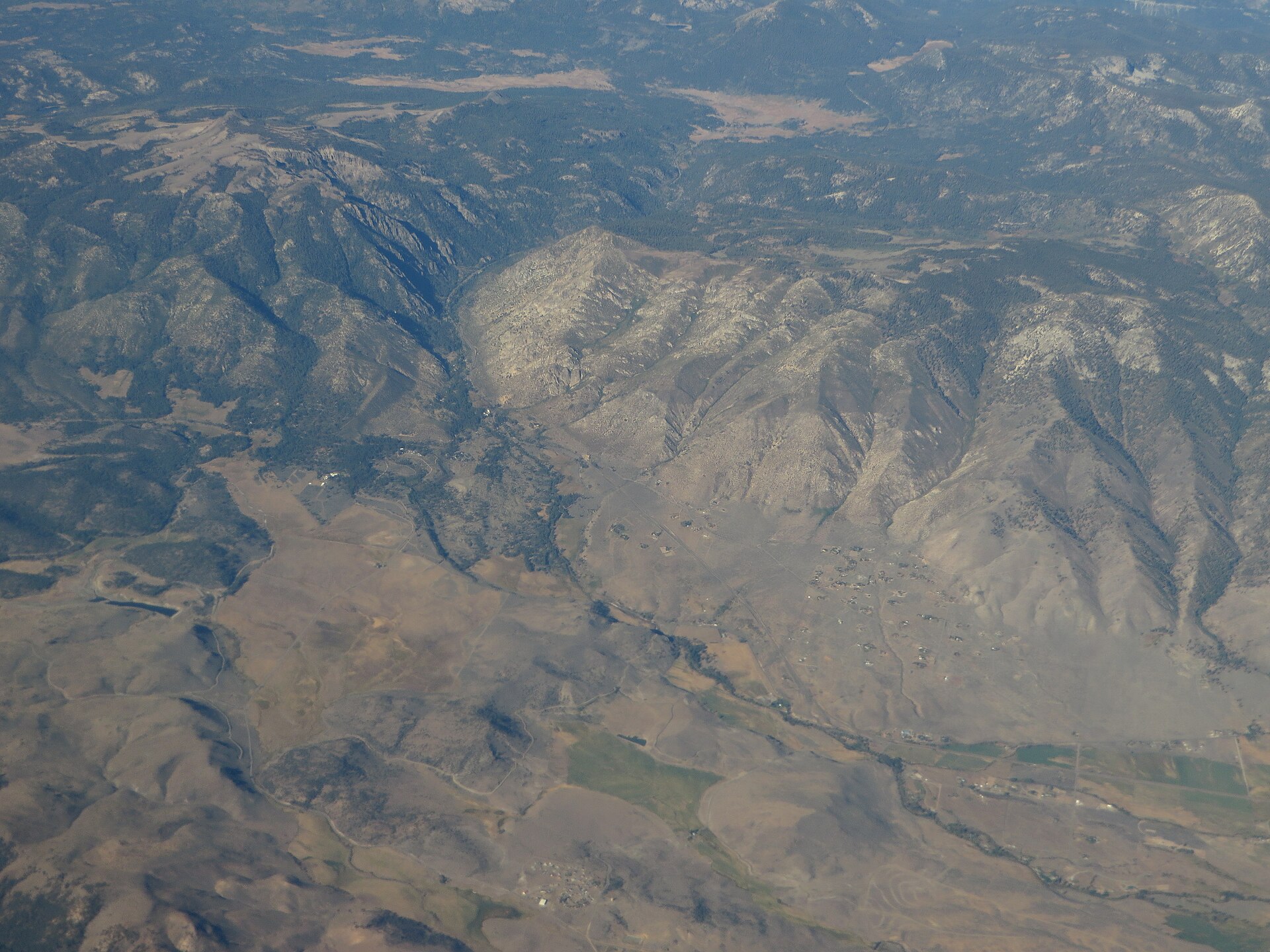 An aerial view of State Route 88 winding through the mountains near Markleeville, California.