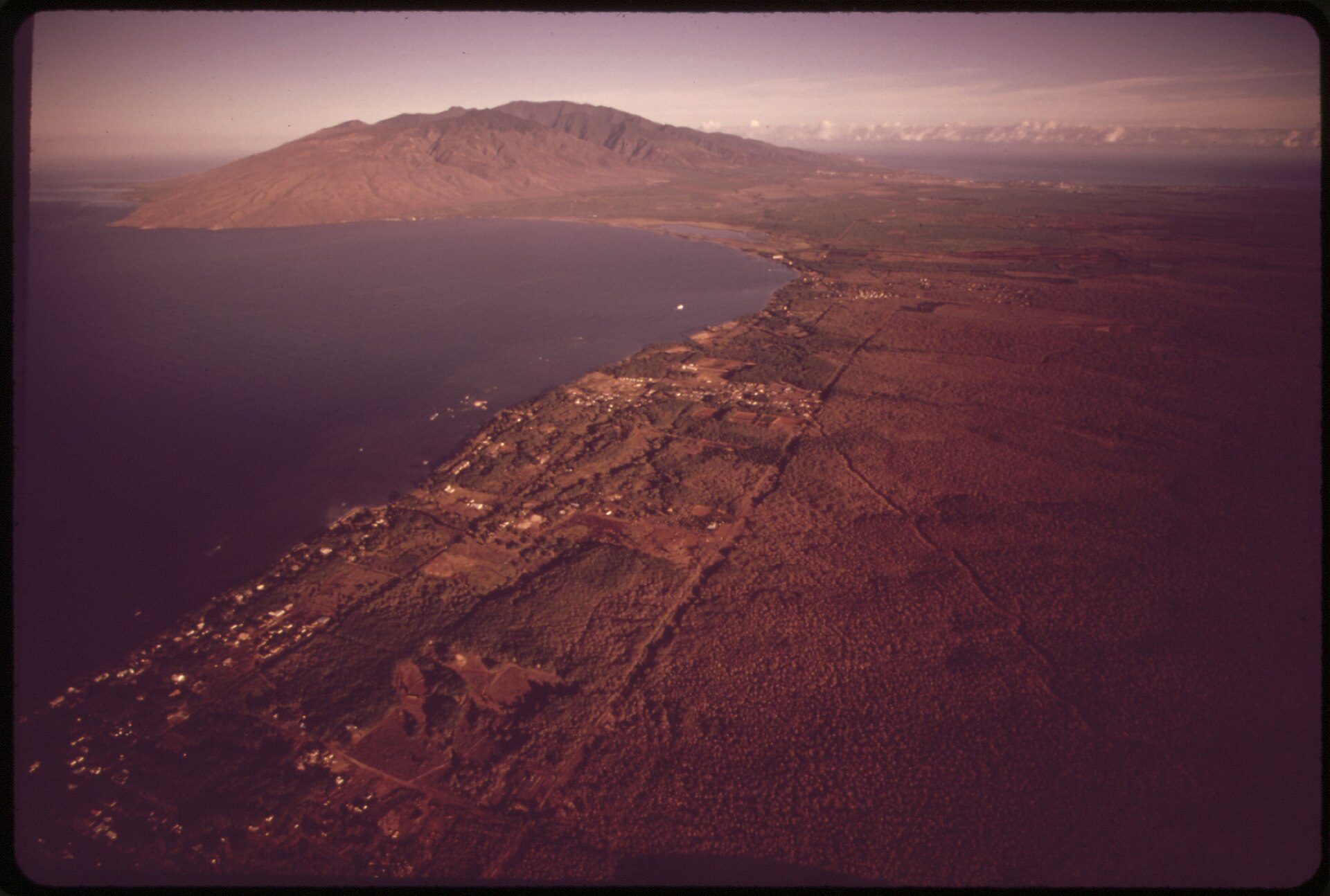 Aerial photograph of the Maalaea Bay coastline with agricultural fields inland
