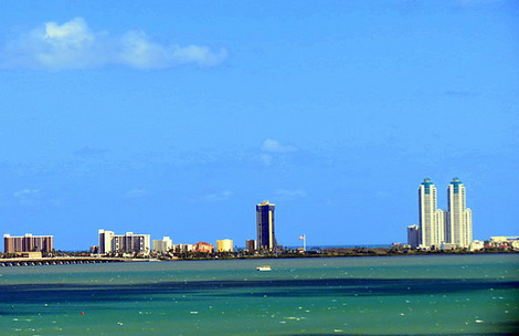 A view across the water toward South Padre Island's towers and shoreline from the Port Isabel lighthouse.
