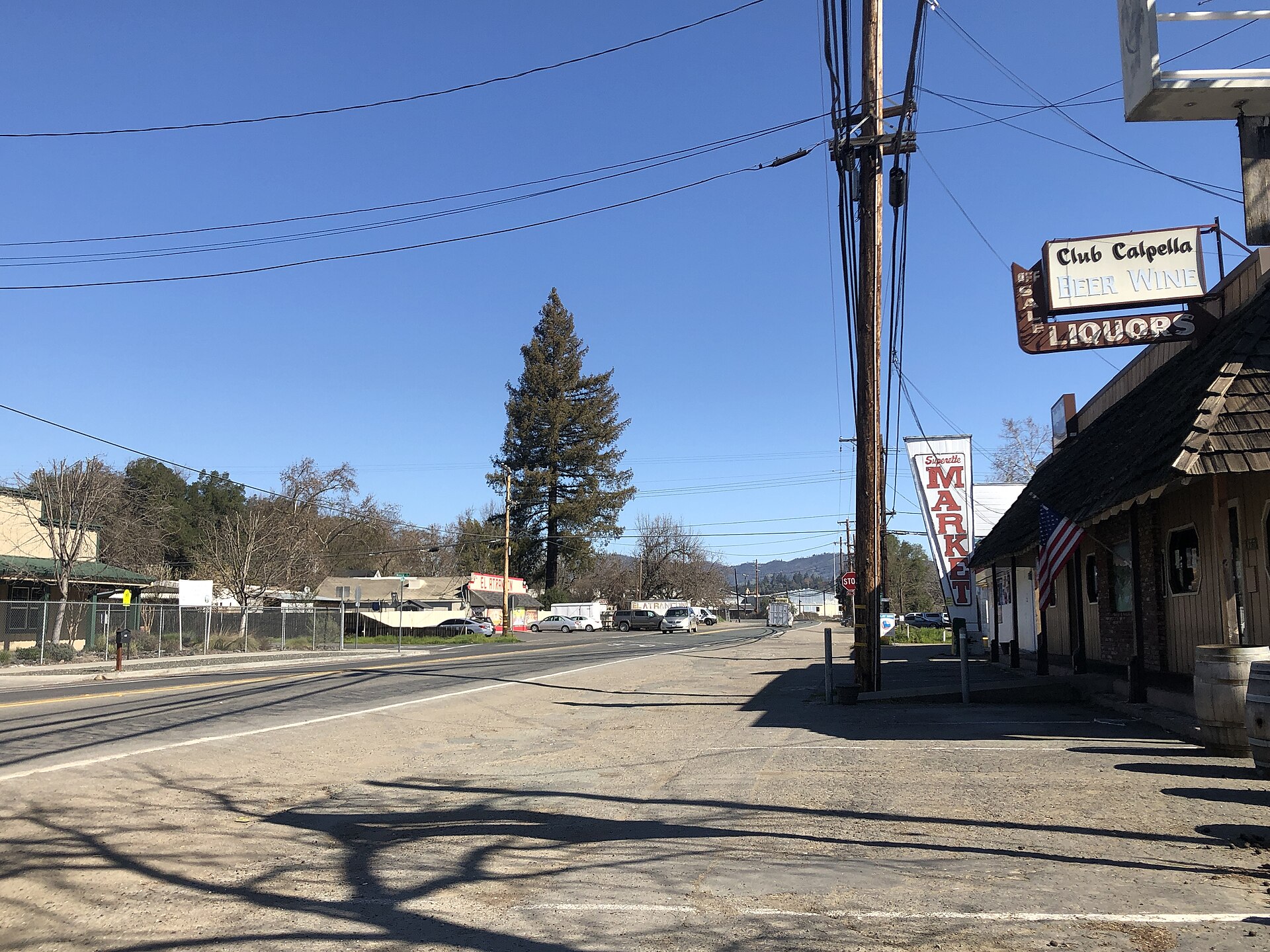 Street view of Club Calpella bar and liquor store on the main road through Calpella, California