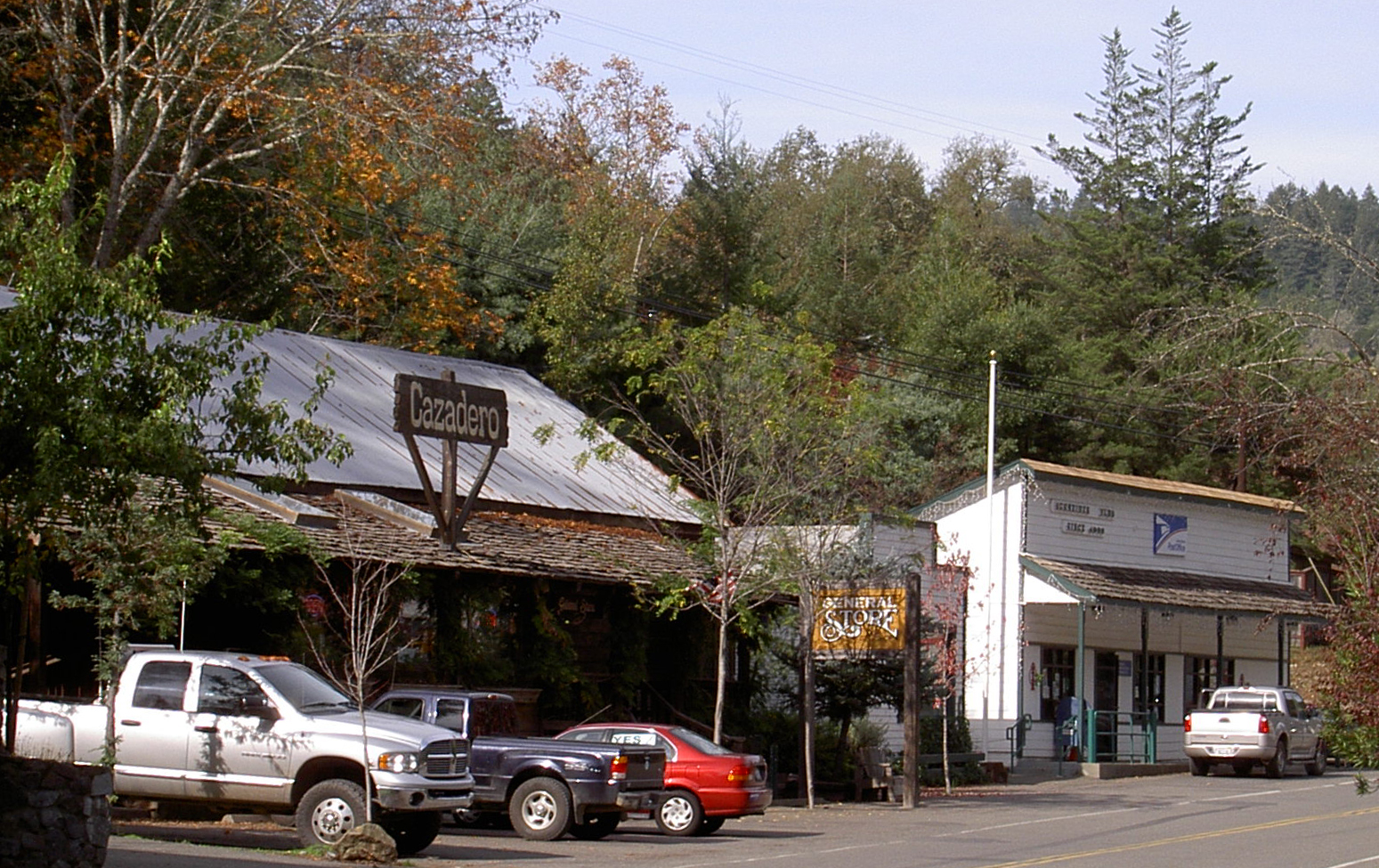 The general store with parked cars in downtown Cazadero California.