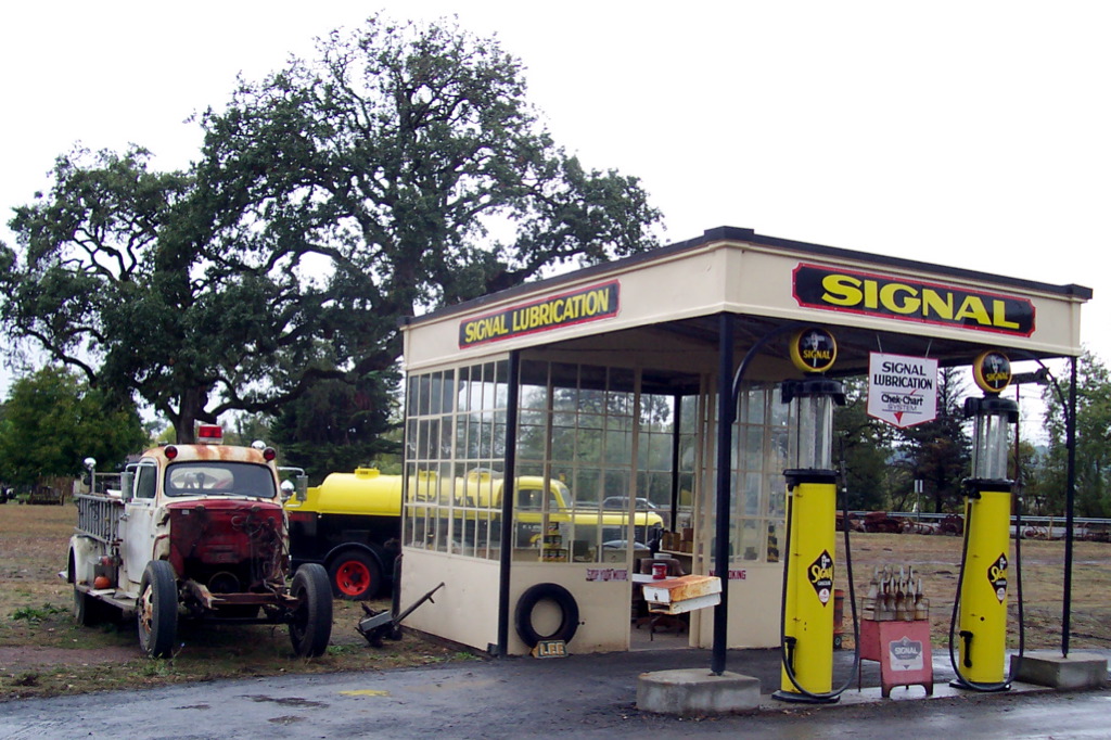 A vintage Signal gas station with old pumps in Larkfield-Wikiup California.