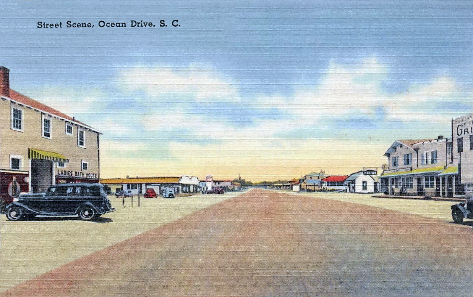 Historic postcard view of a North Myrtle Beach street with shops.