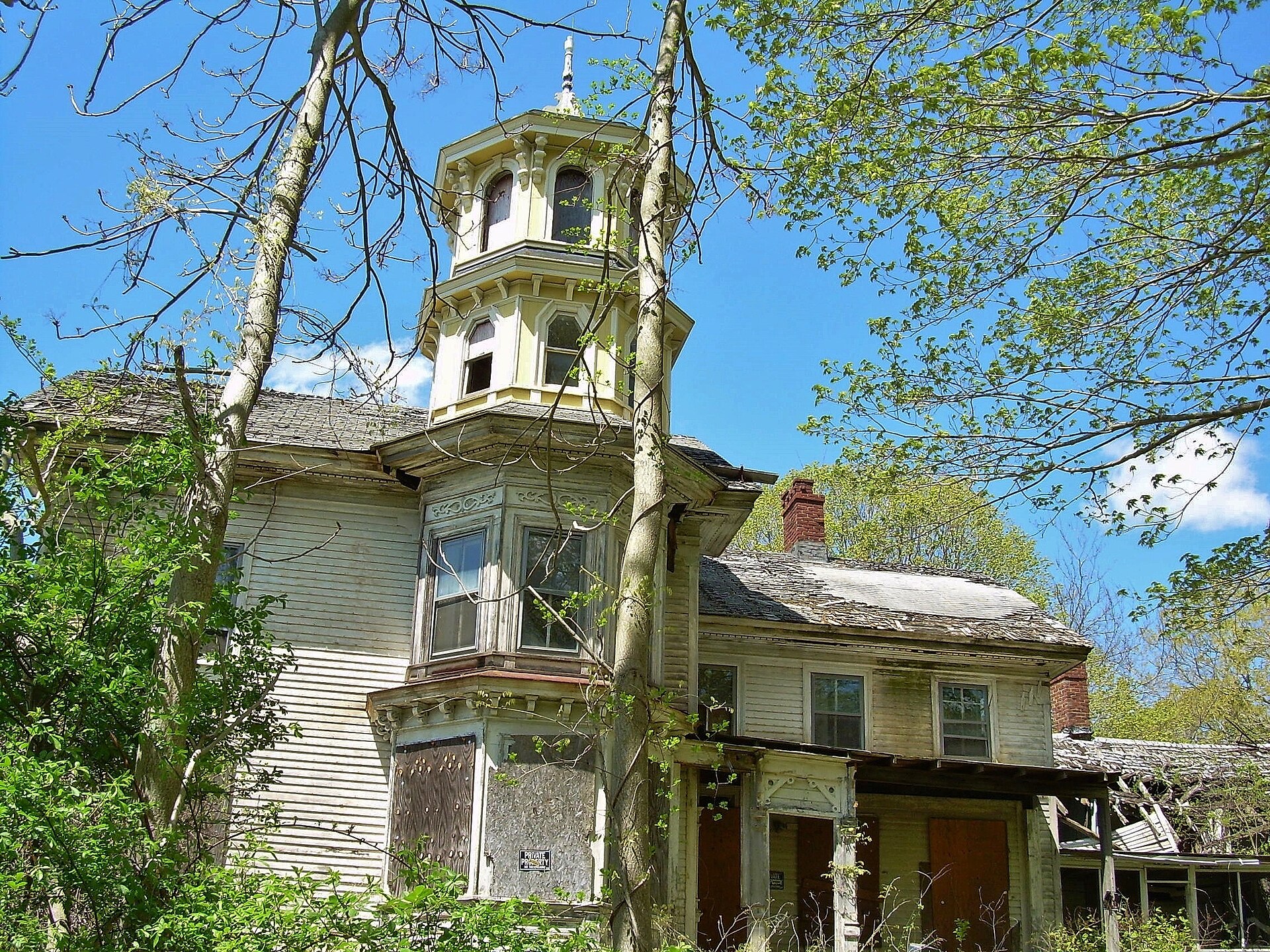 A historic Victorian house with a tower in the Saybrook Manor Connecticut area.