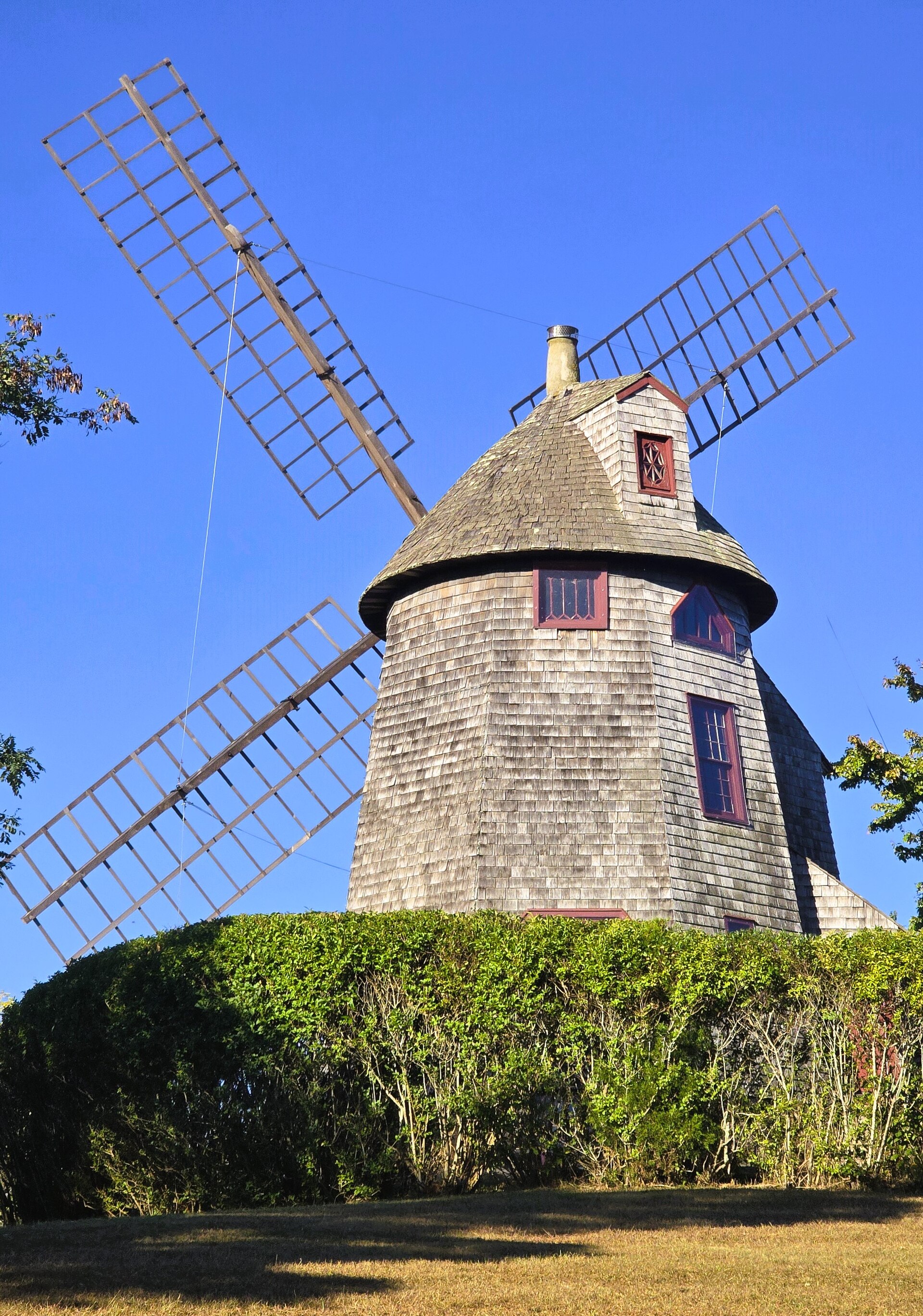 Historic windmill framed against the sky in Shinnecock Hills