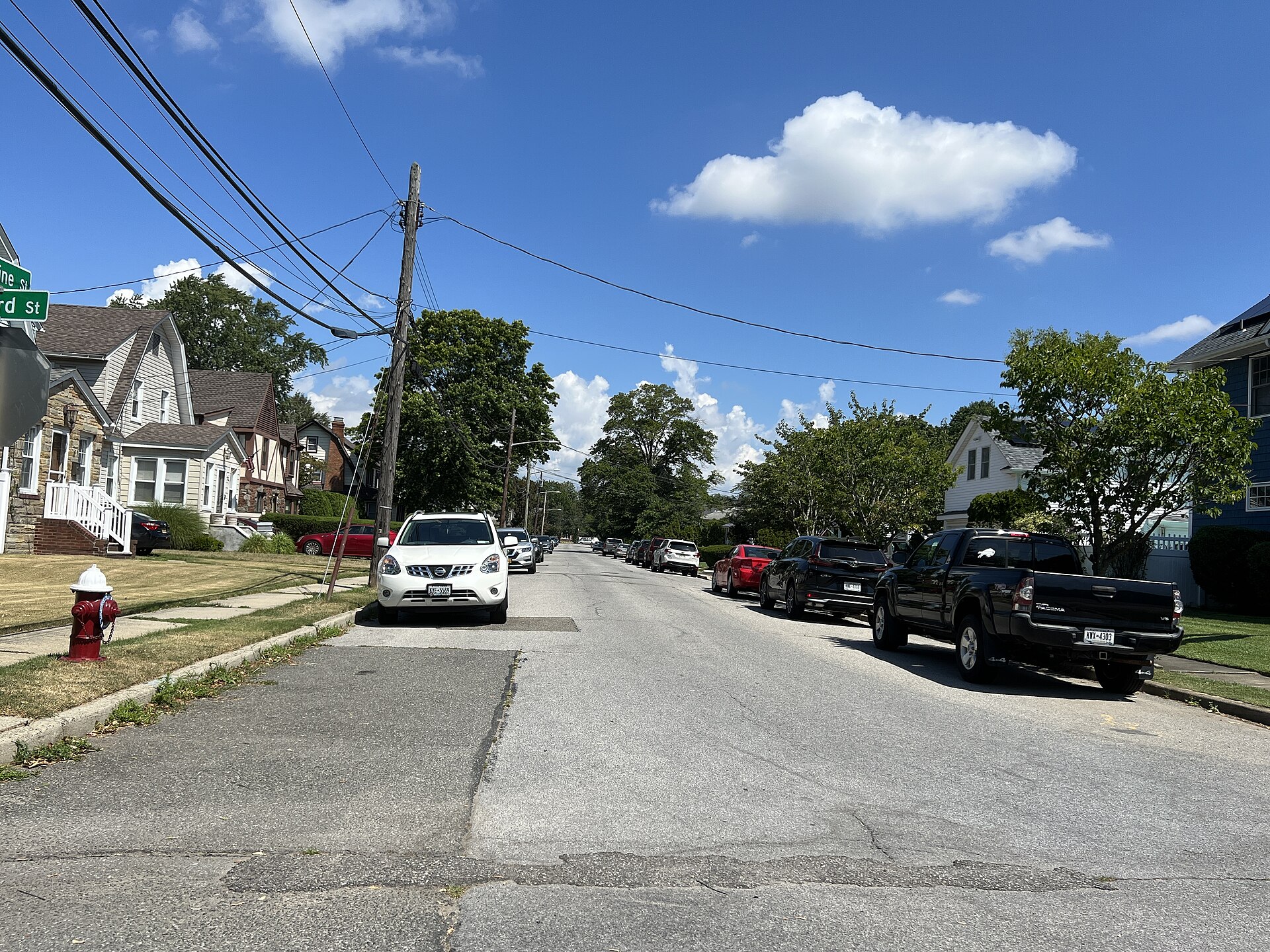 A quiet residential block on Catherine Street in North Lynbrook, New York