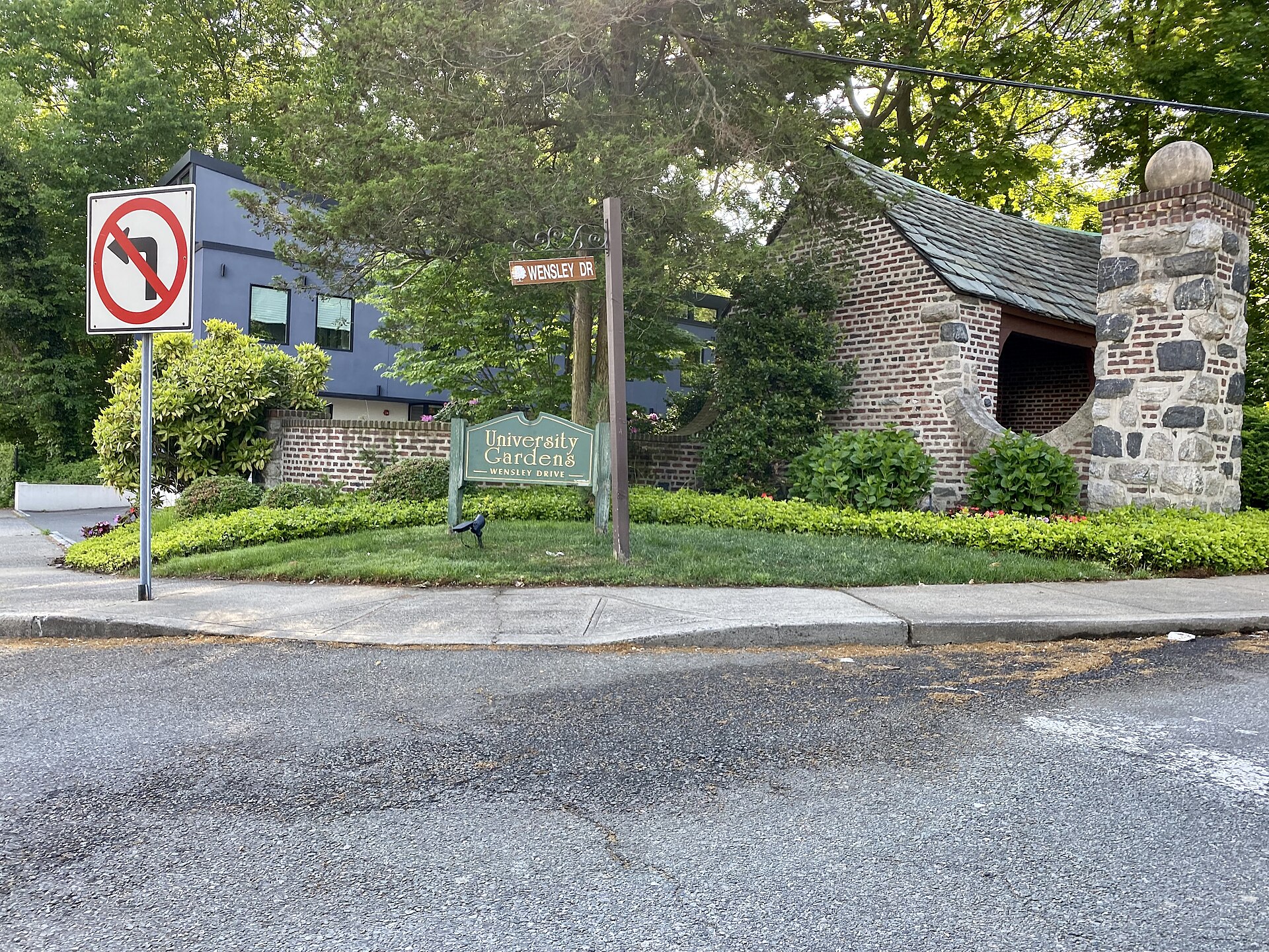 The Wensley Drive entrance sign to the University Gardens community in New York.