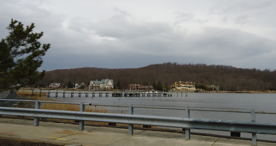 Docks and waterfront homes on the Navesink River seen from the Oceanic Bridge