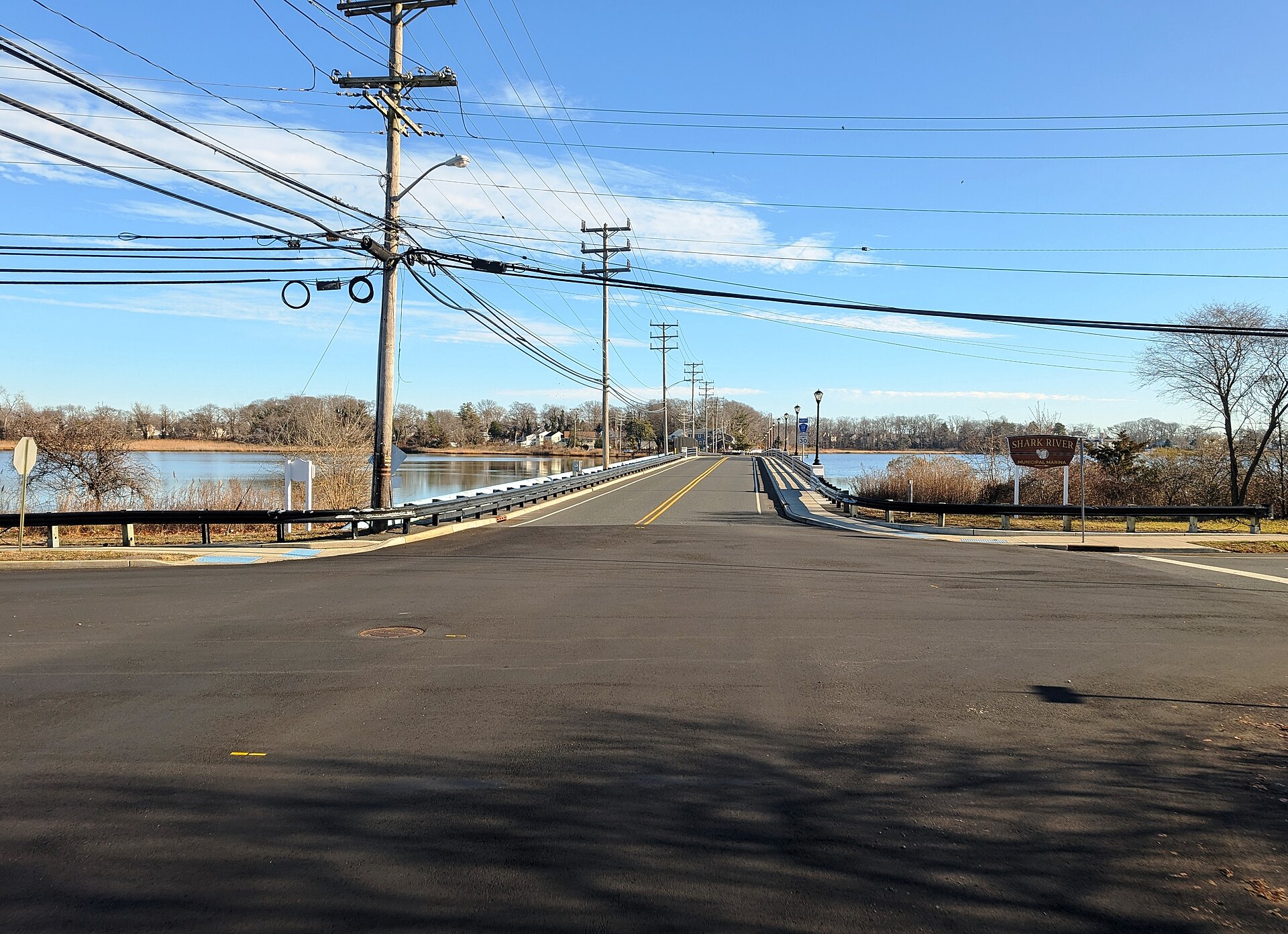 The Lakewood Road bridge crossing the Shark River near the municipal marina in Neptune Township, New Jersey