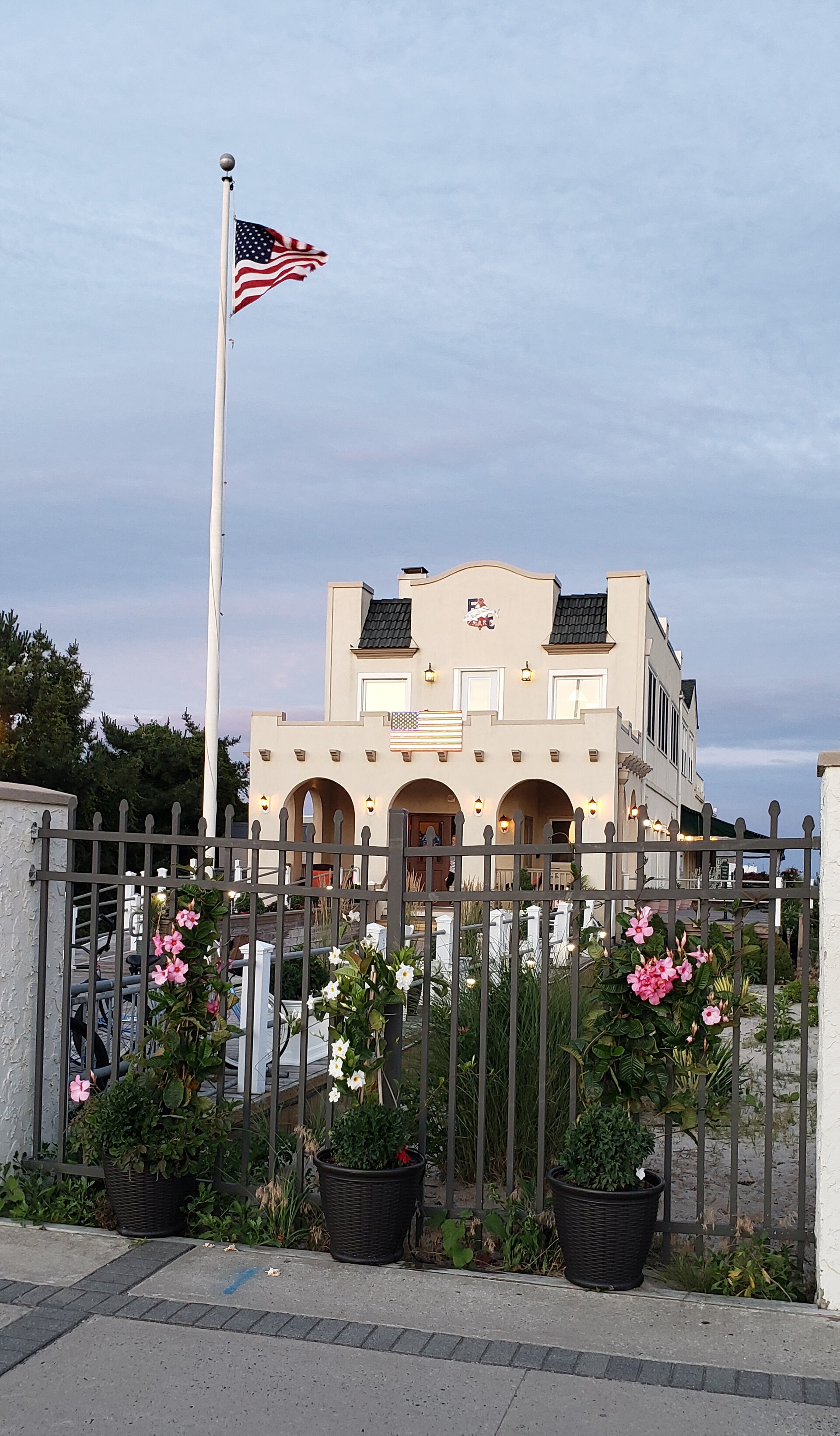 A municipal building with an American flag in Belmar New Jersey, adjacent to West Belmar.