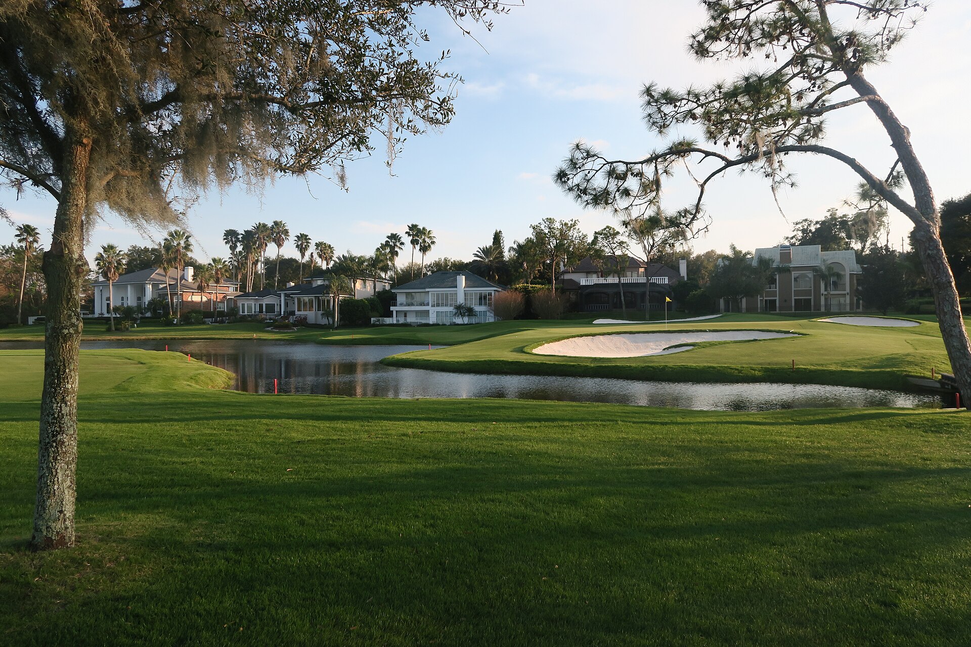 The 16th hole at Bay Hill Club in Orlando framed by estate homes