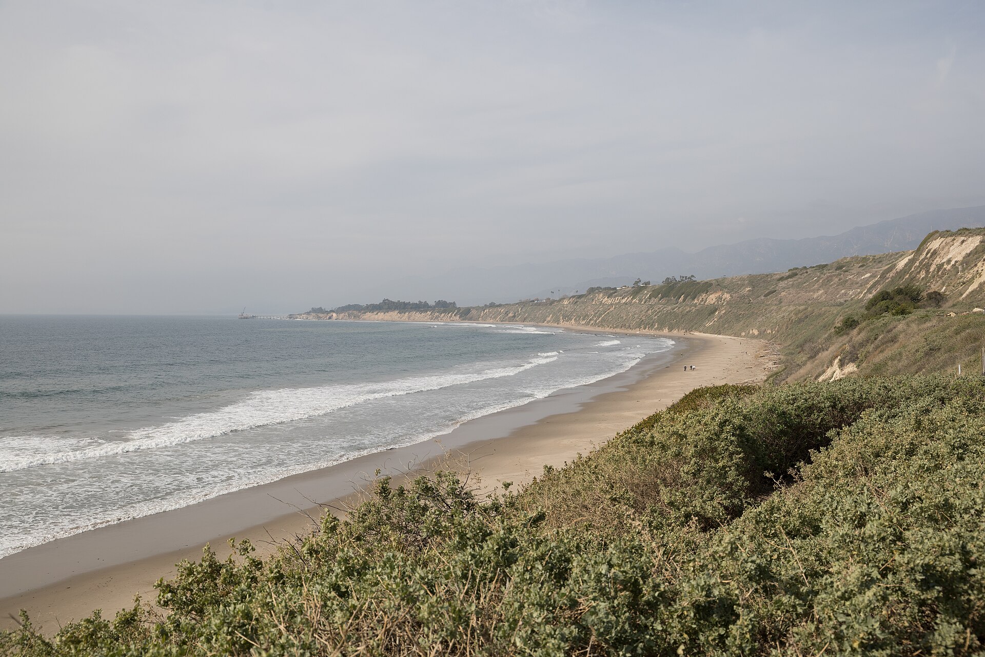 Sandy beach and surf at Rincon Beach County Park in Carpinteria