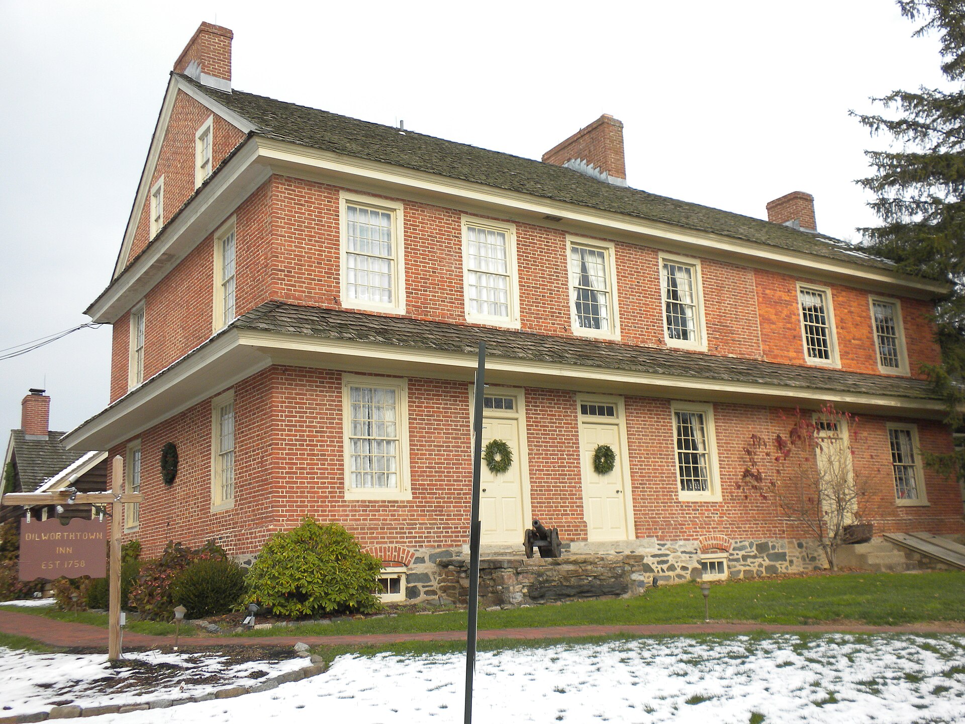 A large brick colonial inn with white trim in Dilworthtown, Pennsylvania.