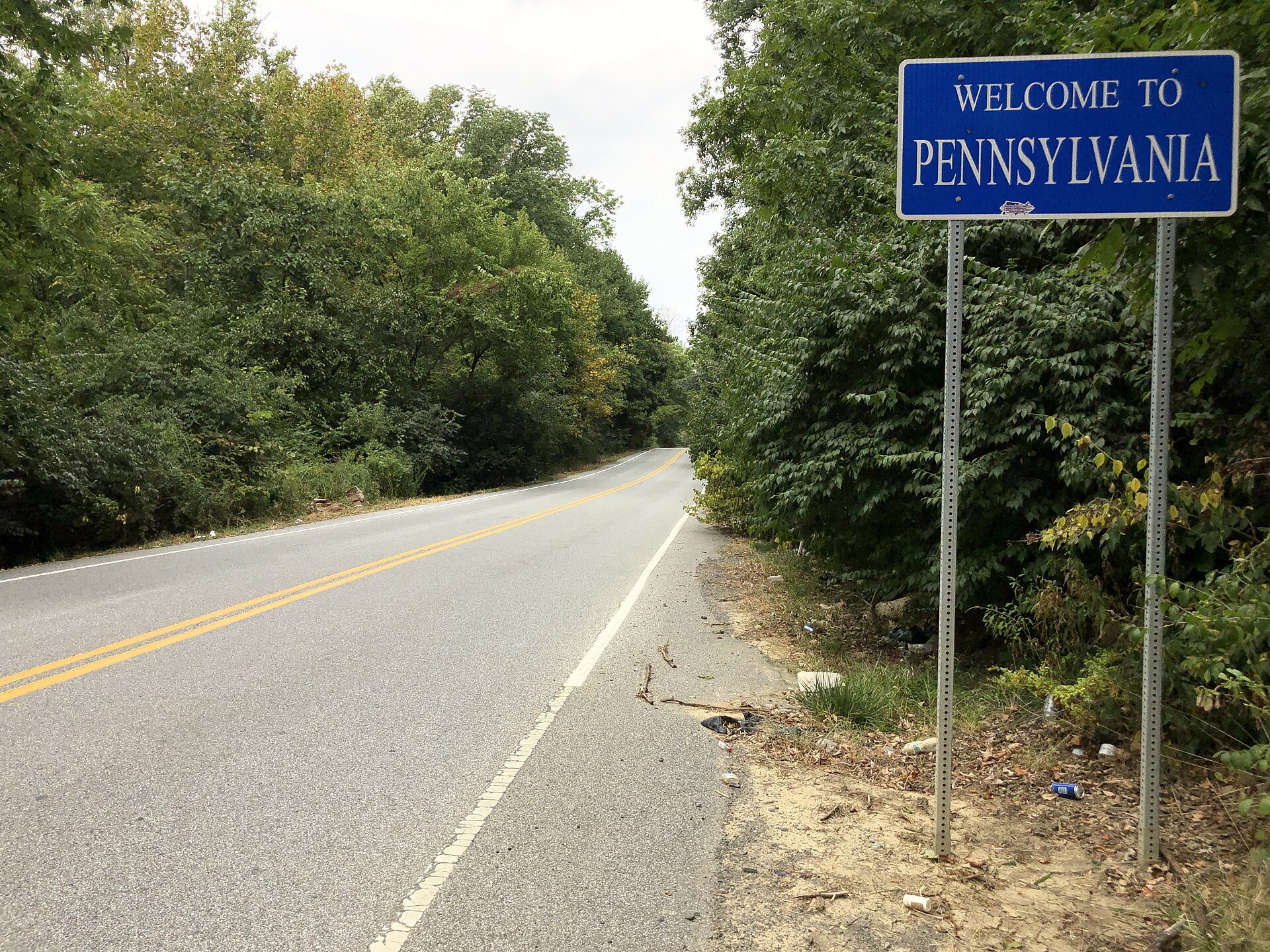 View west along Pennsylvania State Route 491 (Naamans Creek Road) east of Orchard Lane in Lower Chichester Township, Delaware County, Pennsy