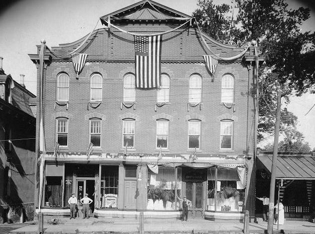The historic Newtown Hardware House storefront.