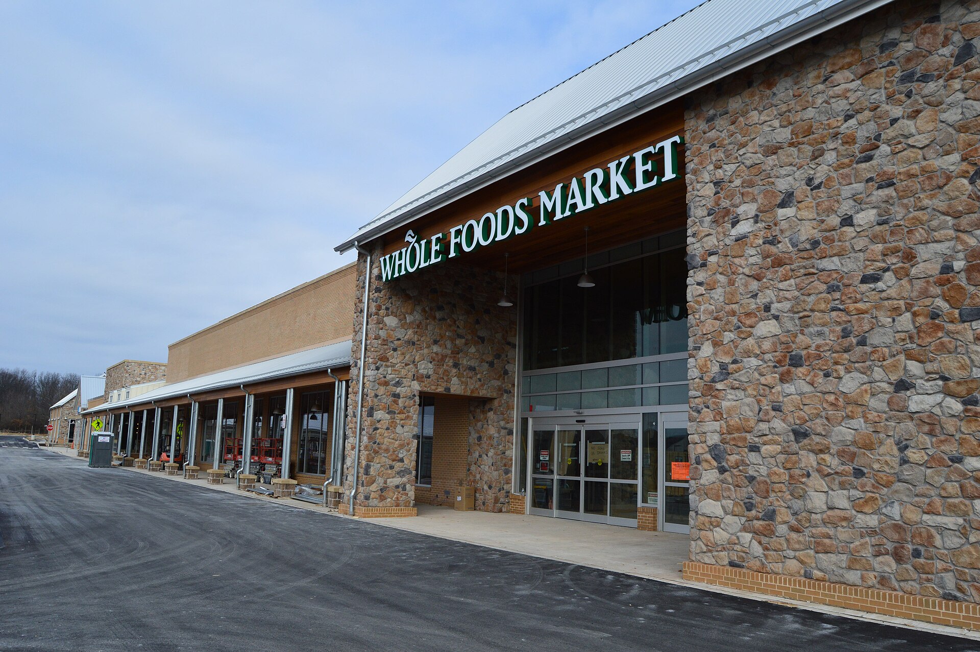 A stone-faced Whole Foods Market storefront in Spring House, Pennsylvania.