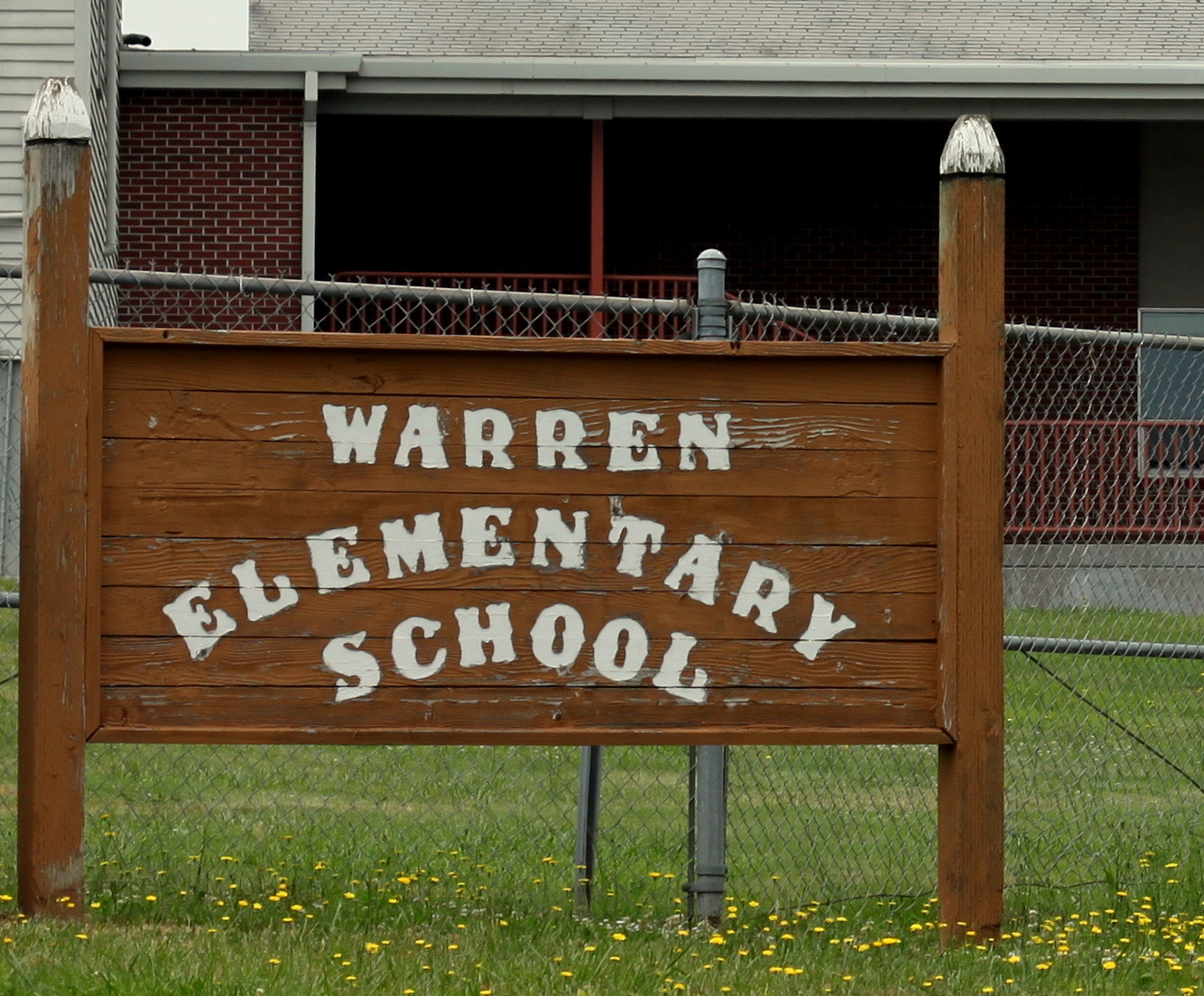 The wooden Warren Elementary School sign in Warren, Oregon.