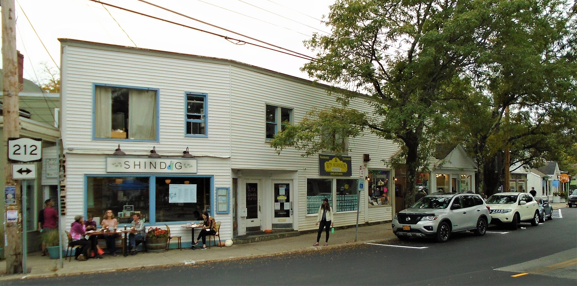 Shops and restaurants on the main street in downtown Woodstock New York.