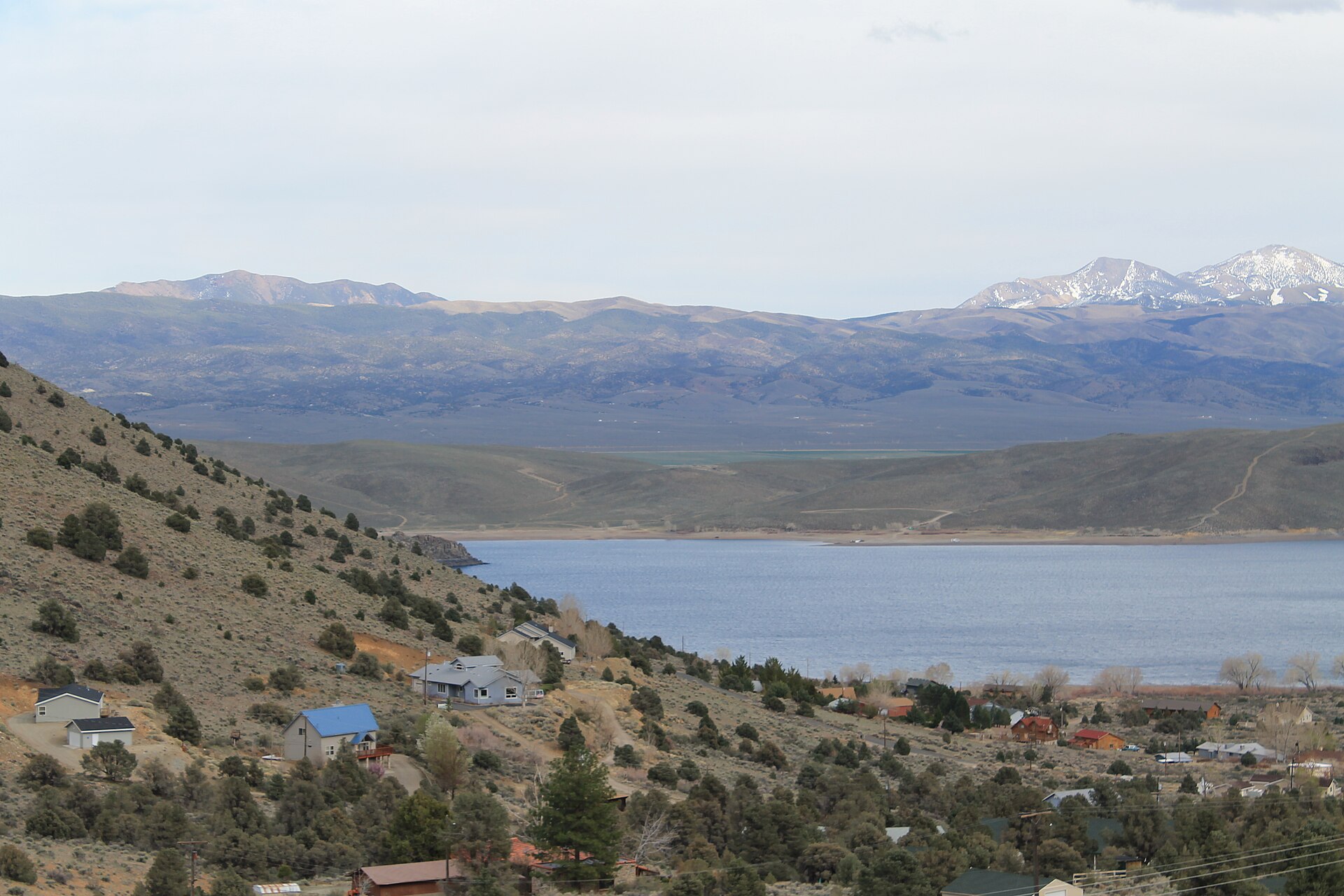 Topaz Lake with the surrounding hills and a small town on its shore