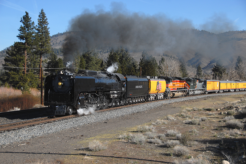 Union Pacific steam locomotive 844 rolling through Verdi, Nevada, with the Sierra foothills behind
