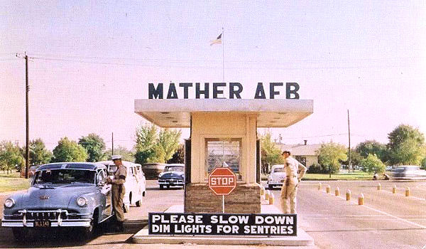 The main gate of Mather Air Force Base with vintage cars, in Mather California.