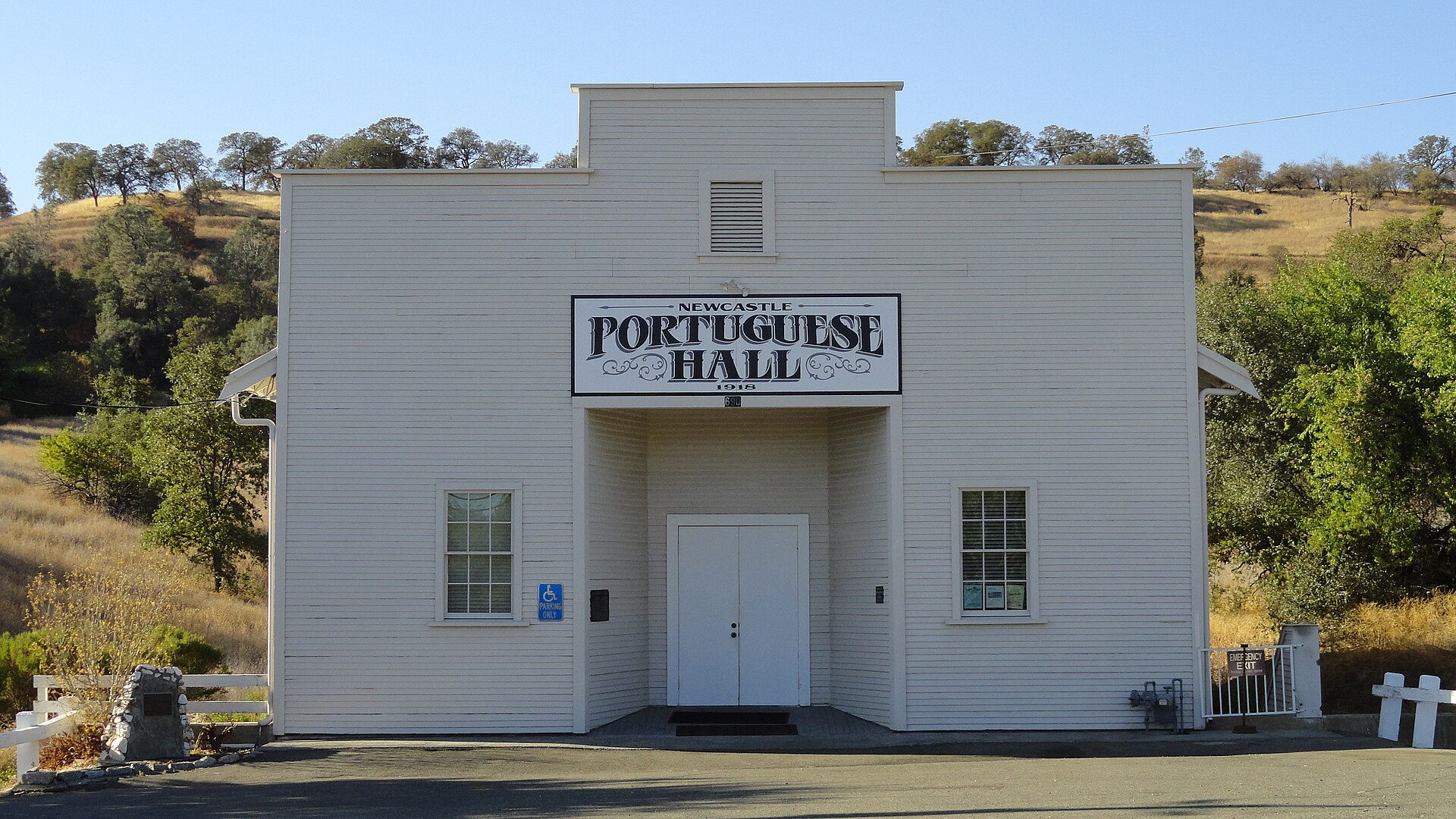 The white wooden Newcastle Portuguese Hall, built in 1918, in Newcastle, California