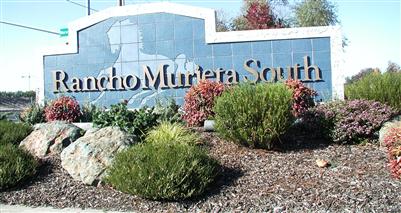 A landscaped stone entrance sign reading Rancho Murieta South in Rancho Murieta, California.