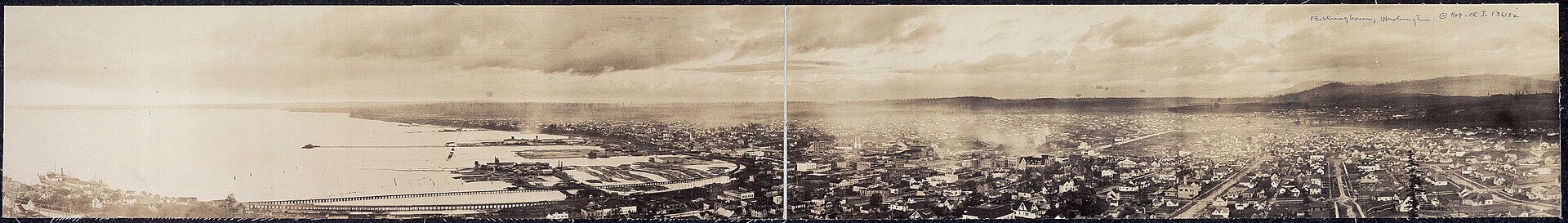 Wide black-and-white panoramic photograph of Bellingham from 1909.