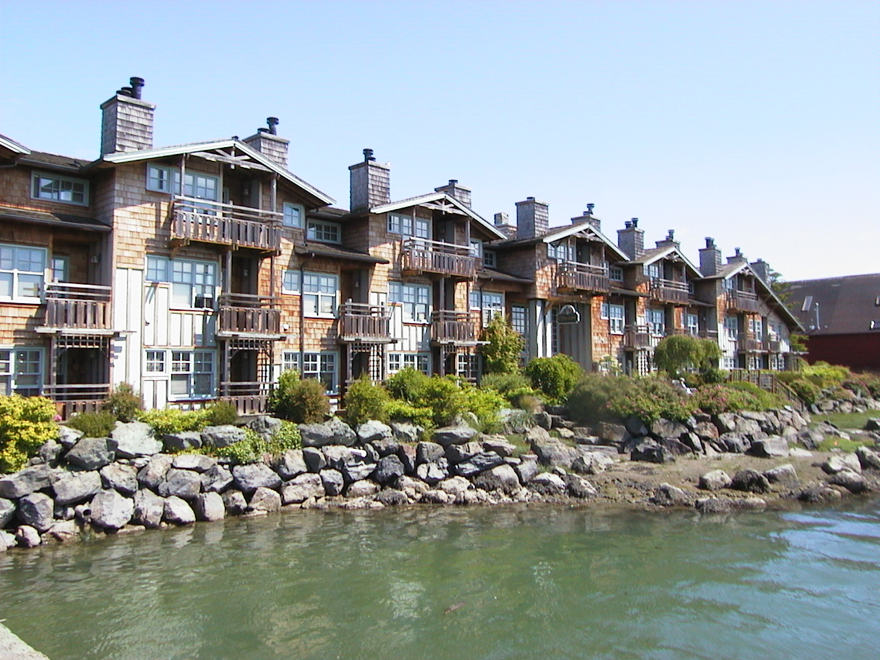 Waterfront condominium buildings along the water in La Conner Washington.