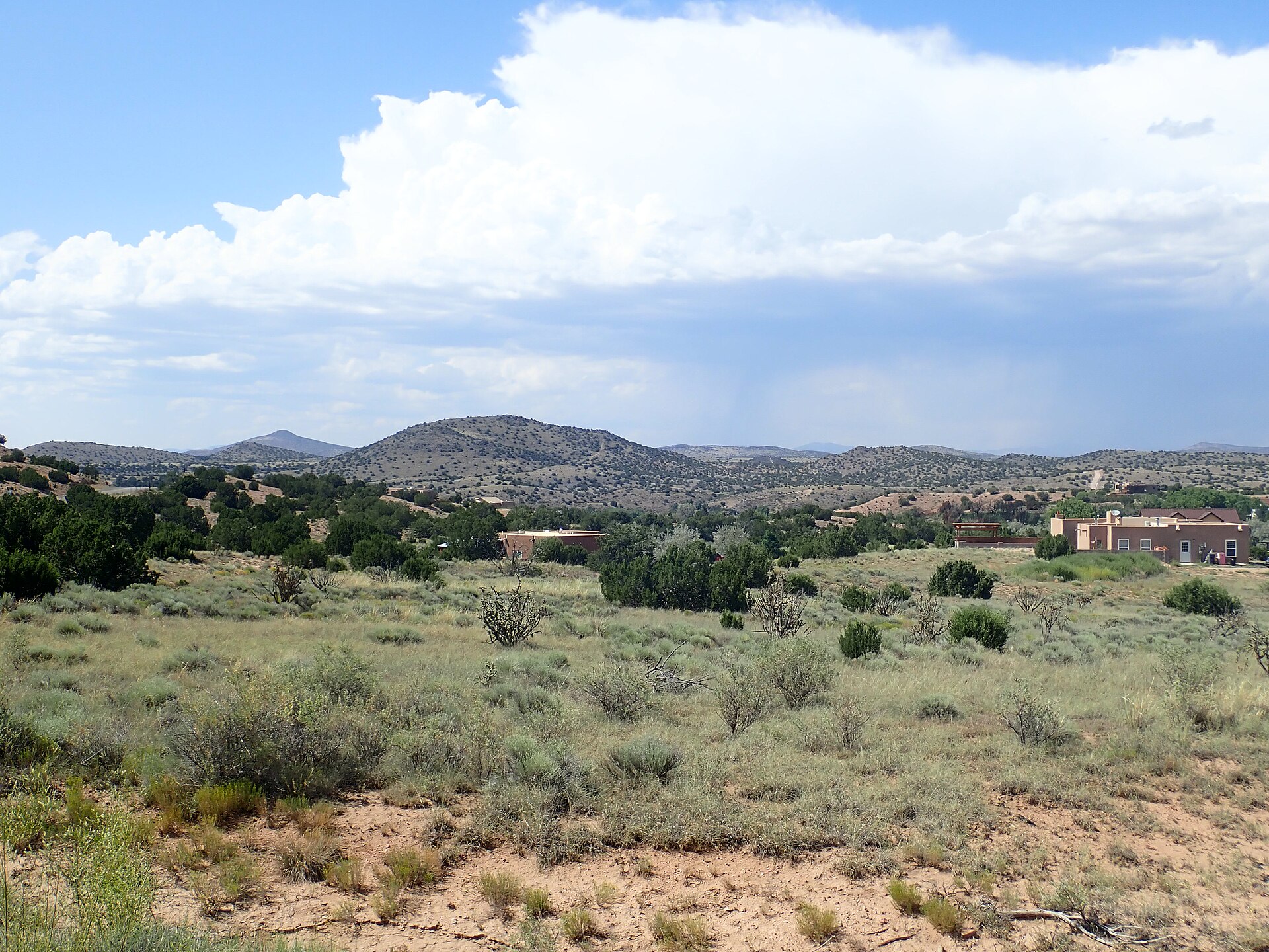 High-desert landscape with adobe homes near Cerro Seguro