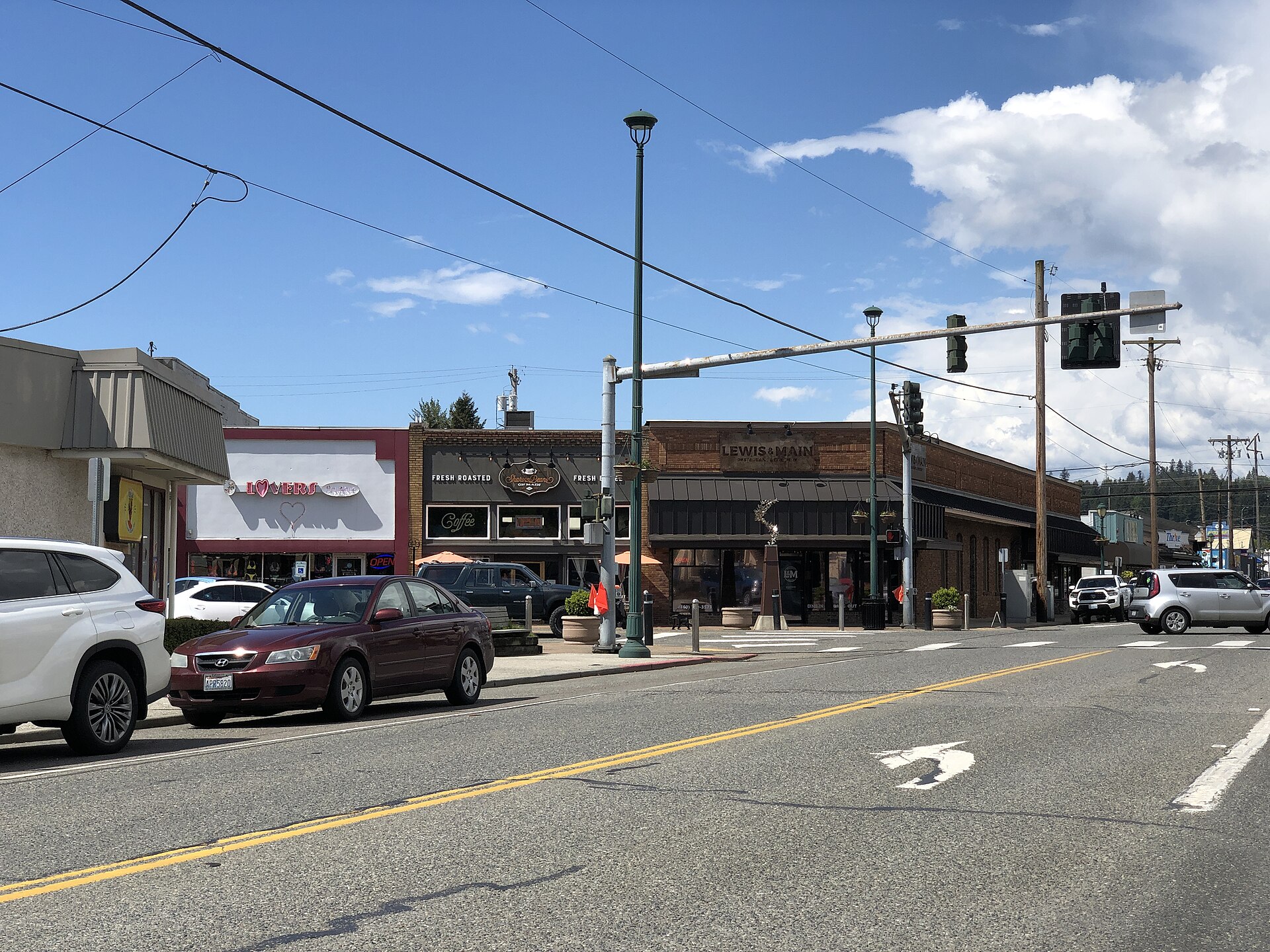 A street with shops in downtown Monroe Washington, adjacent to North Monroe.