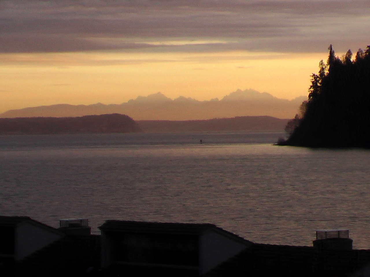 Sunrise over the Cascades, seen from Port Ludlow, Washington.
