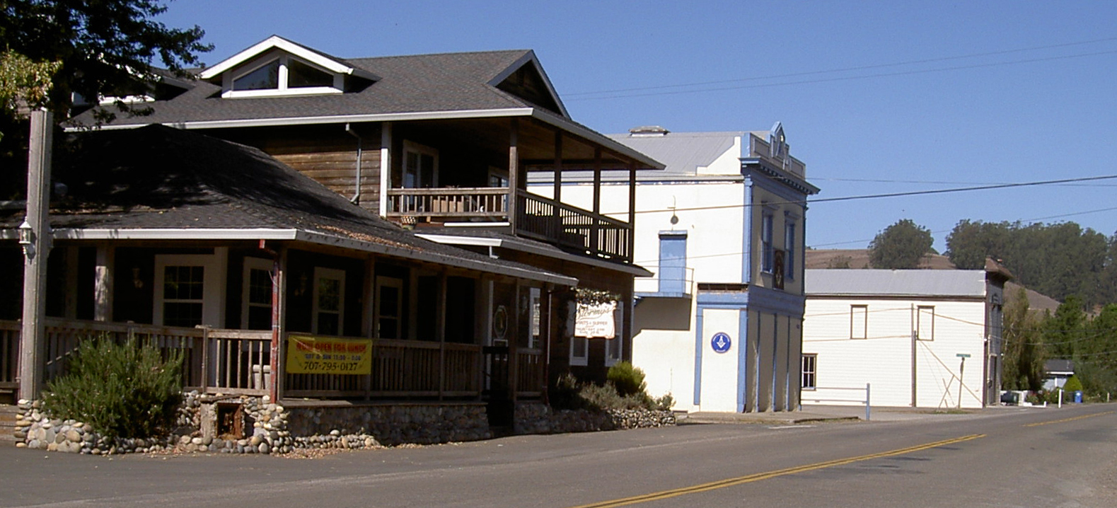More historic wooden buildings along Bloomfield's main street.