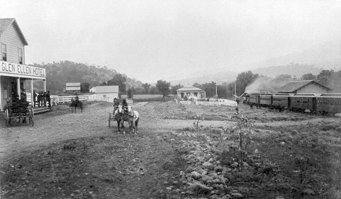 1888 photograph of the Glen Ellen Hotel with horse-drawn wagons and a steam train on the town's main street.