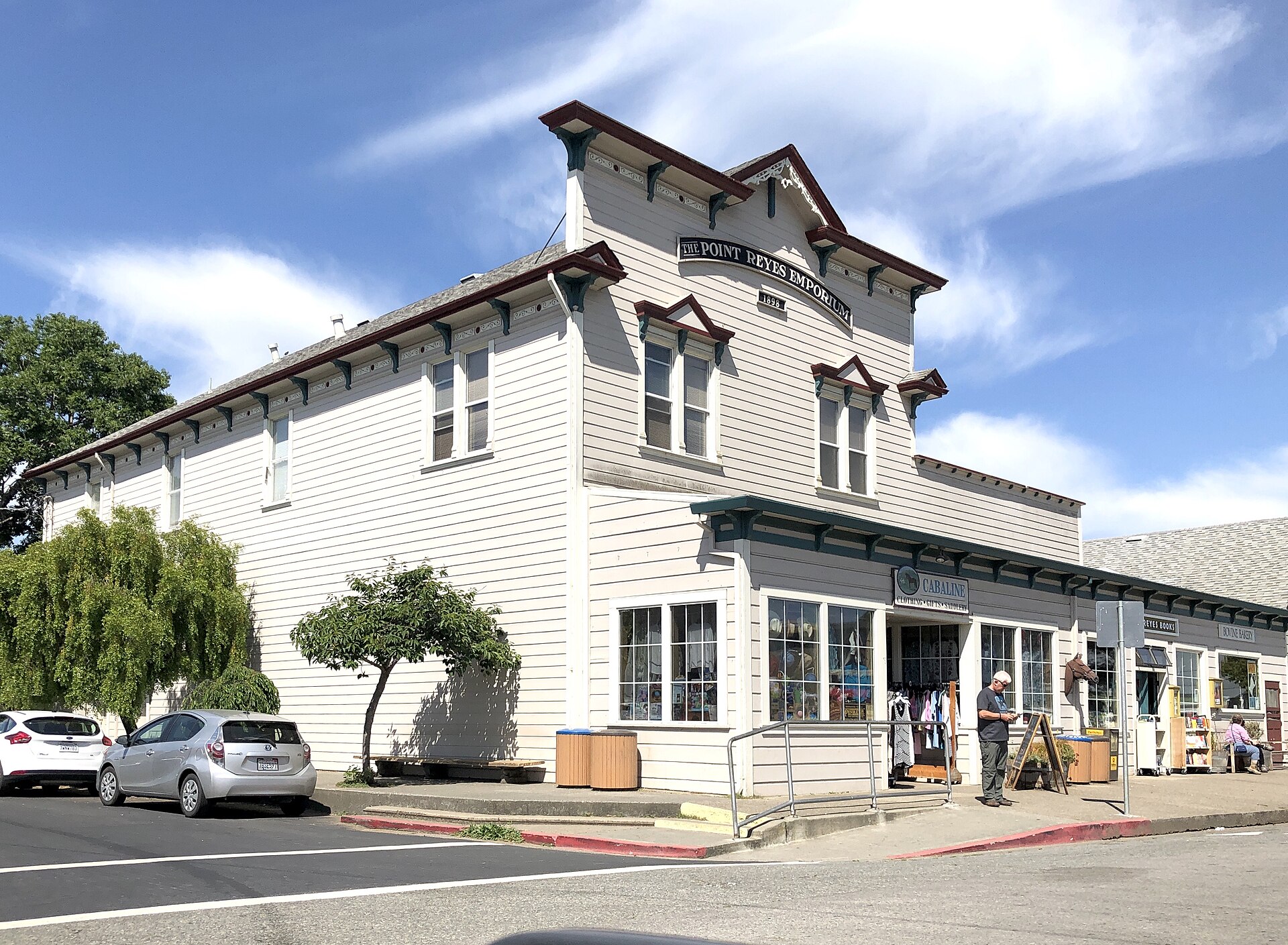 The historic Western Saloon building in downtown Point Reyes Station, a two-story white wooden storefront.
