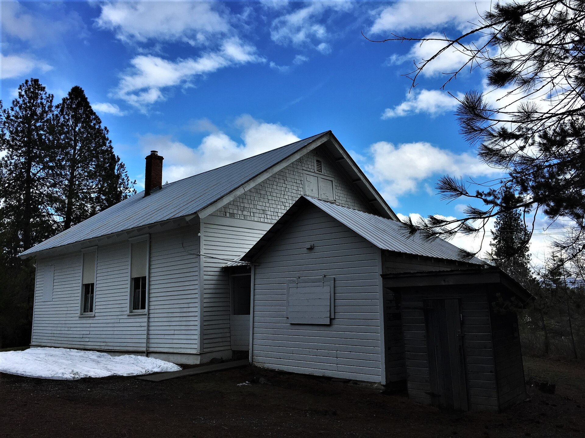 Bellgrove School II, a white 1918 schoolhouse on Hamaker Road about a quarter mile north of Rockford Bay Road.