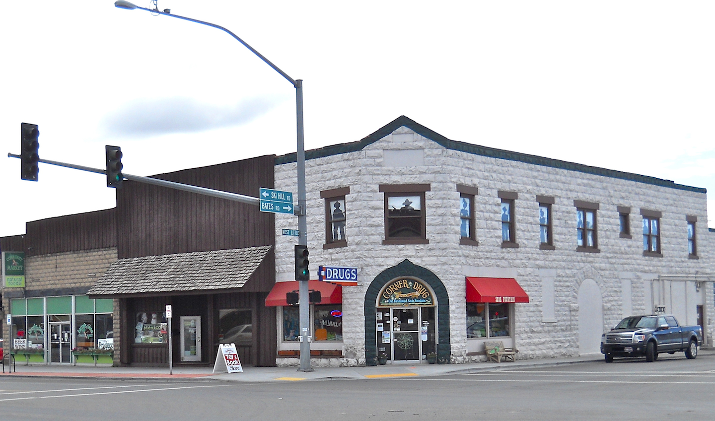 A historic commercial building with red awnings in downtown Driggs Idaho.