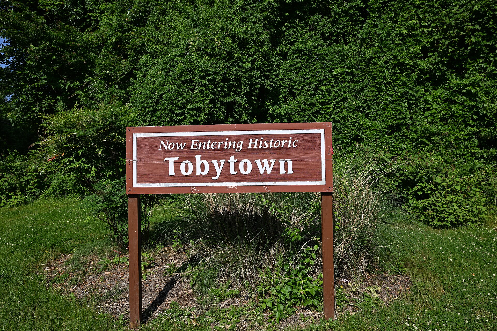 The welcome sign for Tobytown, a historic community in Travilah, Maryland.